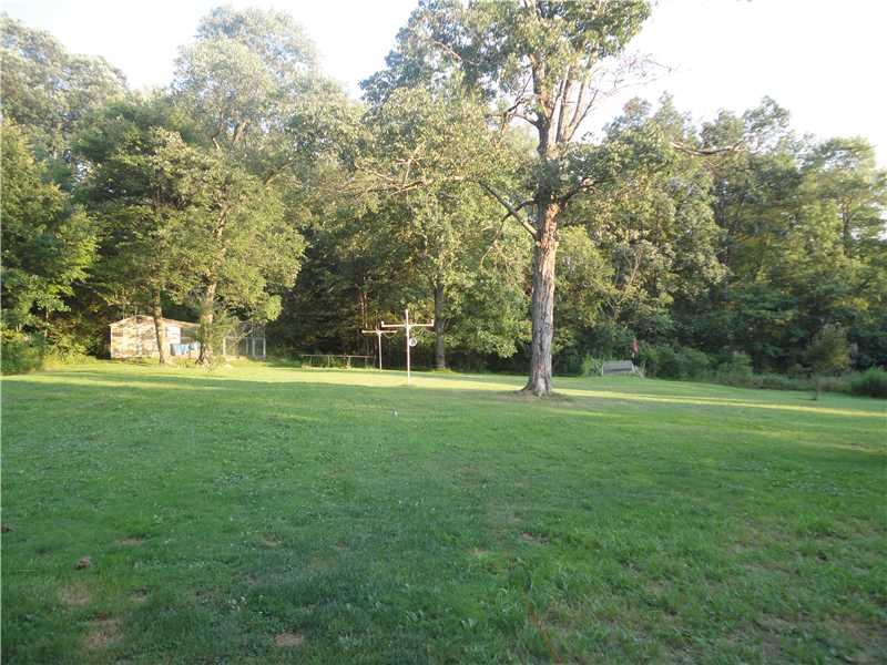 402 Boyers Road Harrisville, PA 16038 - Photo 2 of 5 Land/Lot. Only 1/2 of yard being mowed. Yard goes well into the trees to the rear of home.