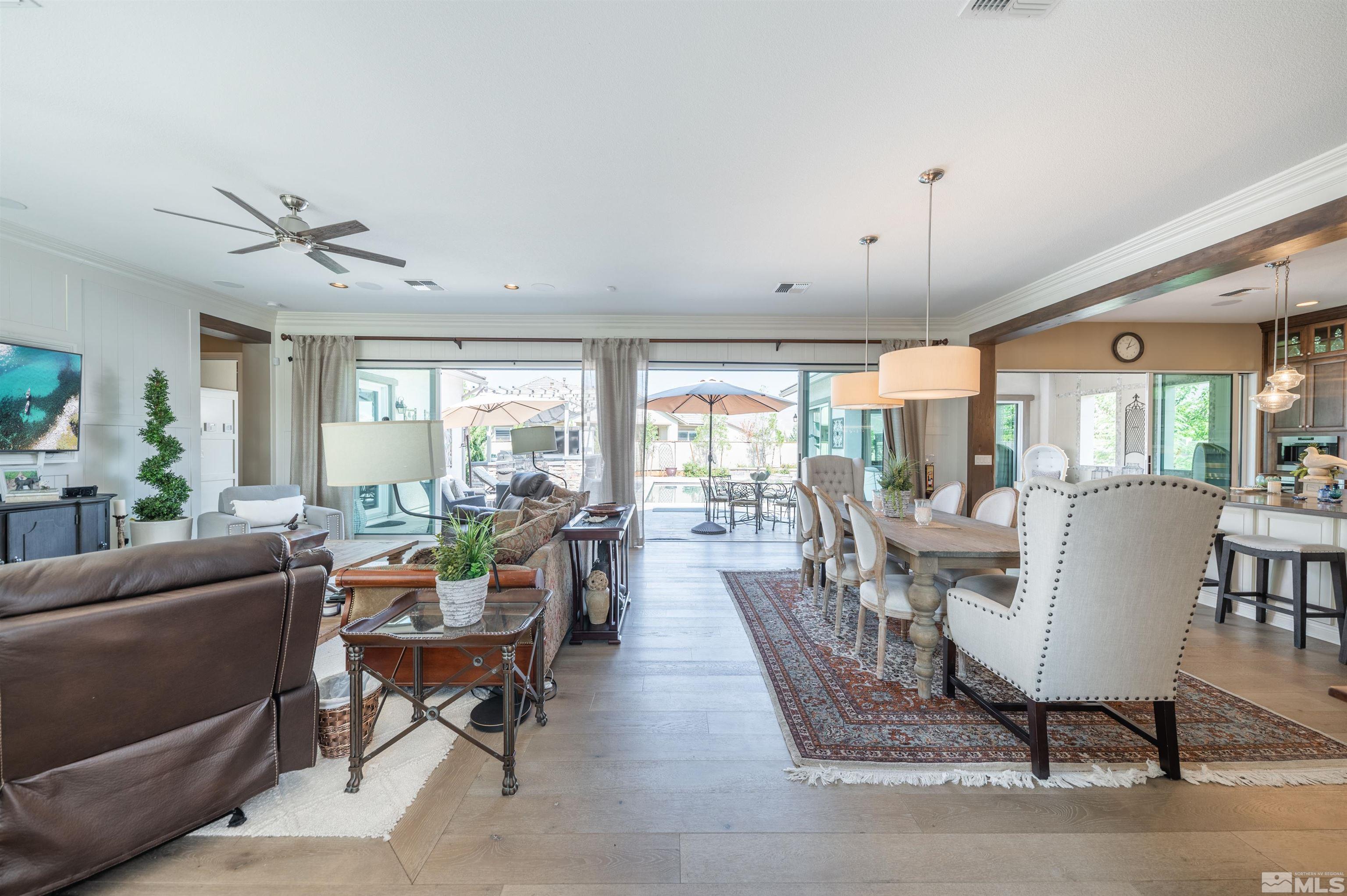 9990 Hafflinger Court Reno, NV 89521 - Photo 3 of 40 a view of a dining room with furniture window and outside view