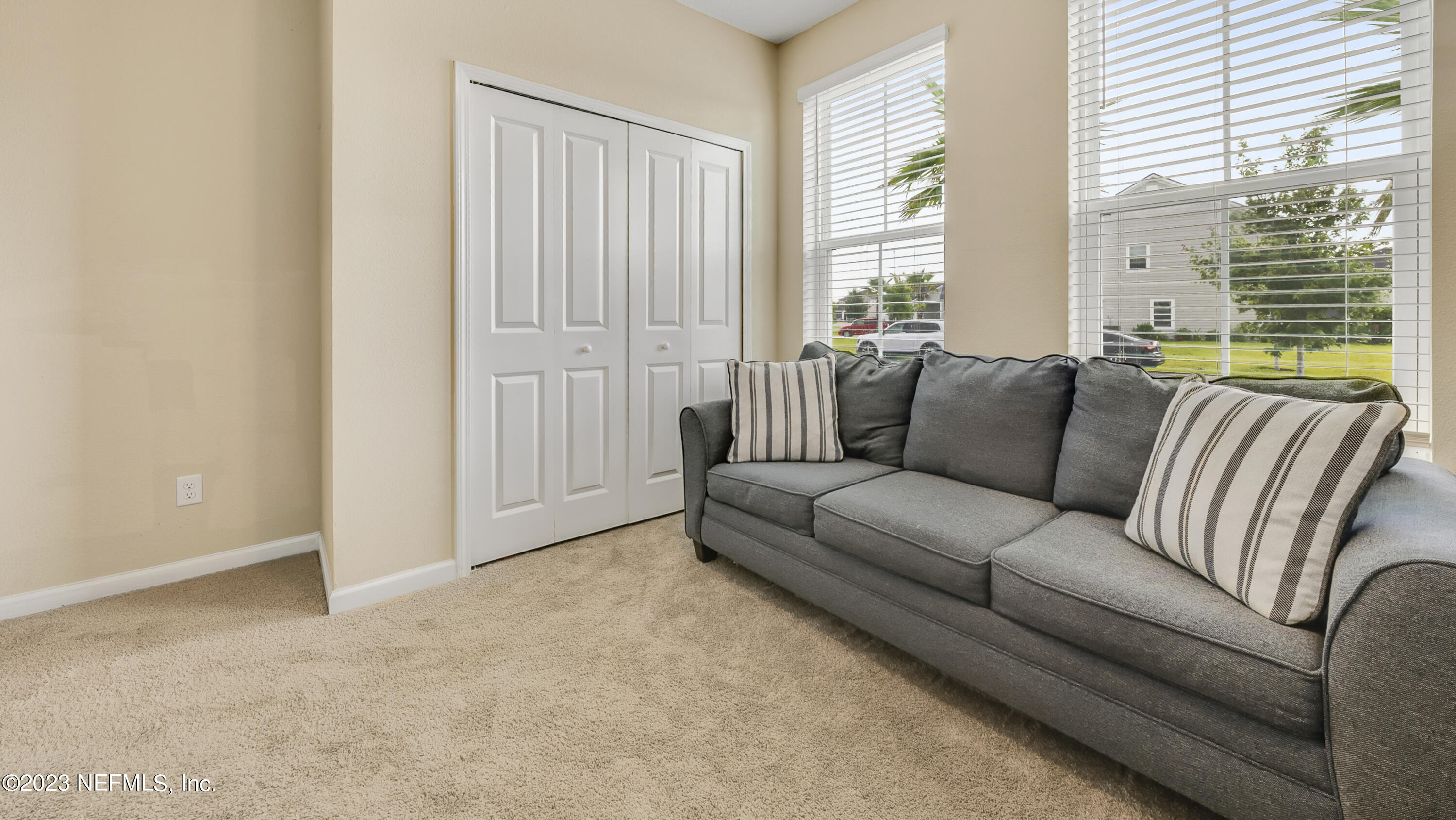 321 Beale Avenue St. Augustine, FL 32092 - Photo 23 of 35 a living room with furniture and a large window