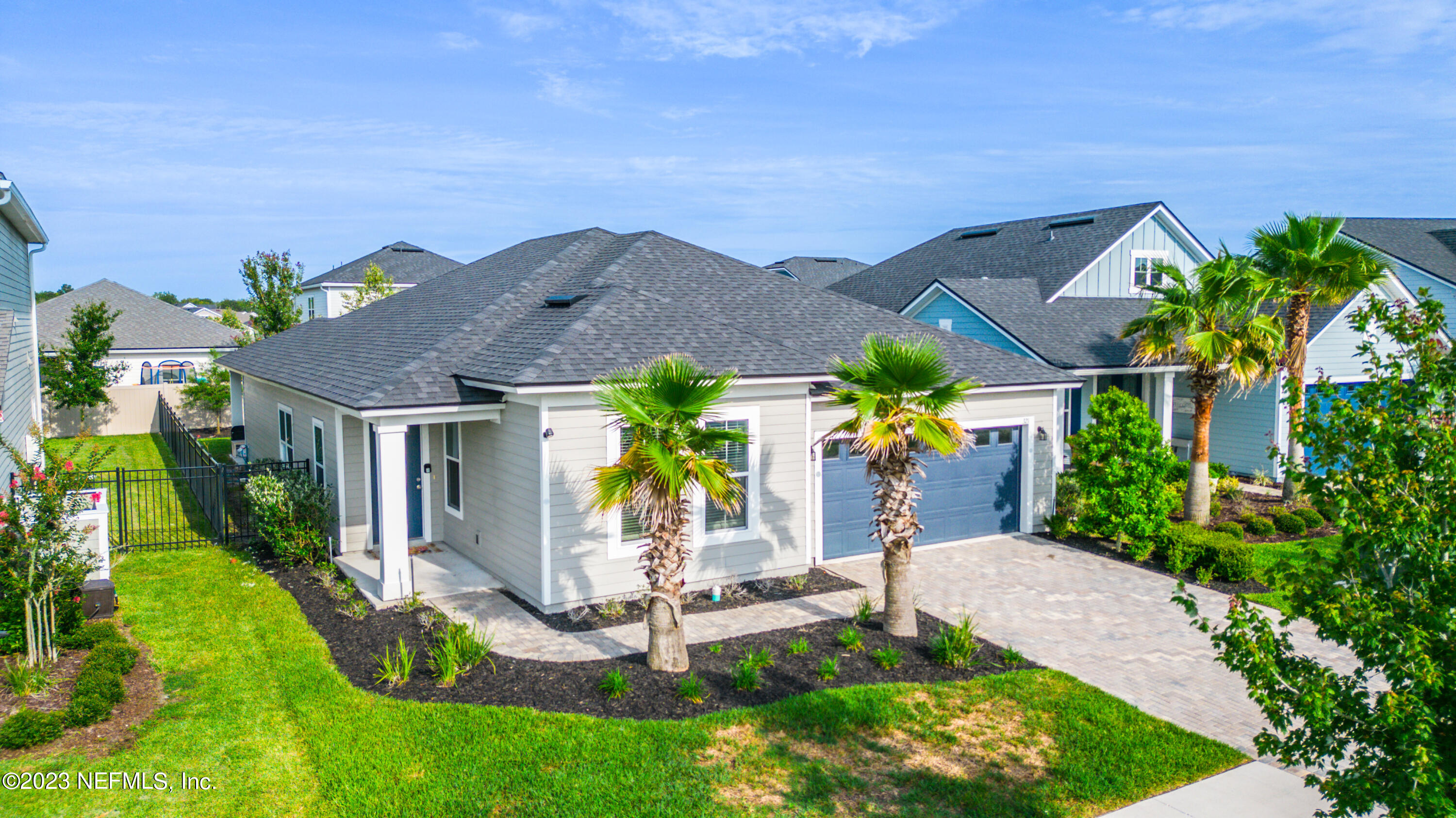 321 Beale Avenue St. Augustine, FL 32092 - Photo 27 of 35 a view of a house with a yard and plants