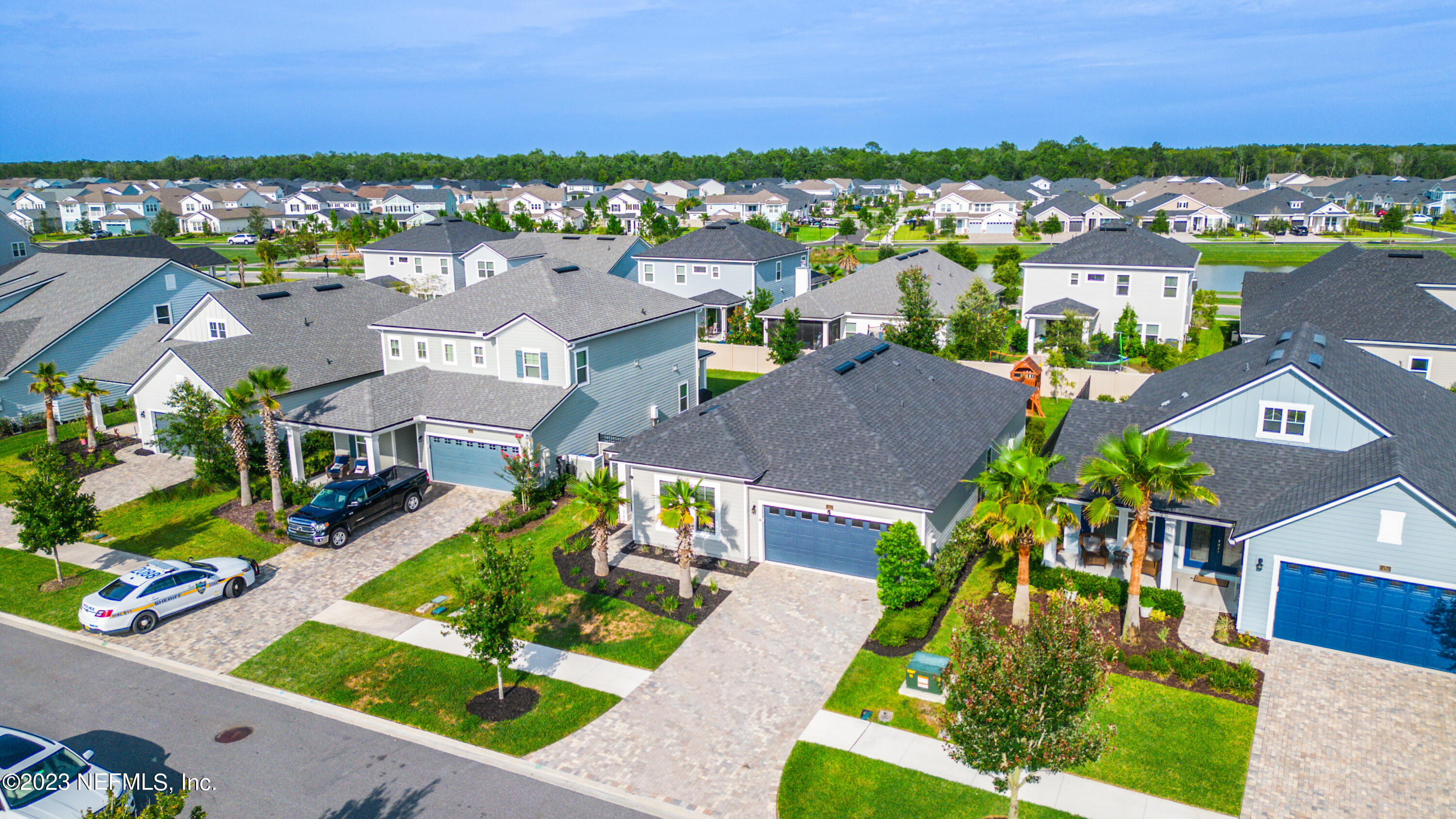 321 Beale Avenue St. Augustine, FL 32092 - Photo 29 of 35 an aerial view of a house with a swimming pool yard and outdoor seating