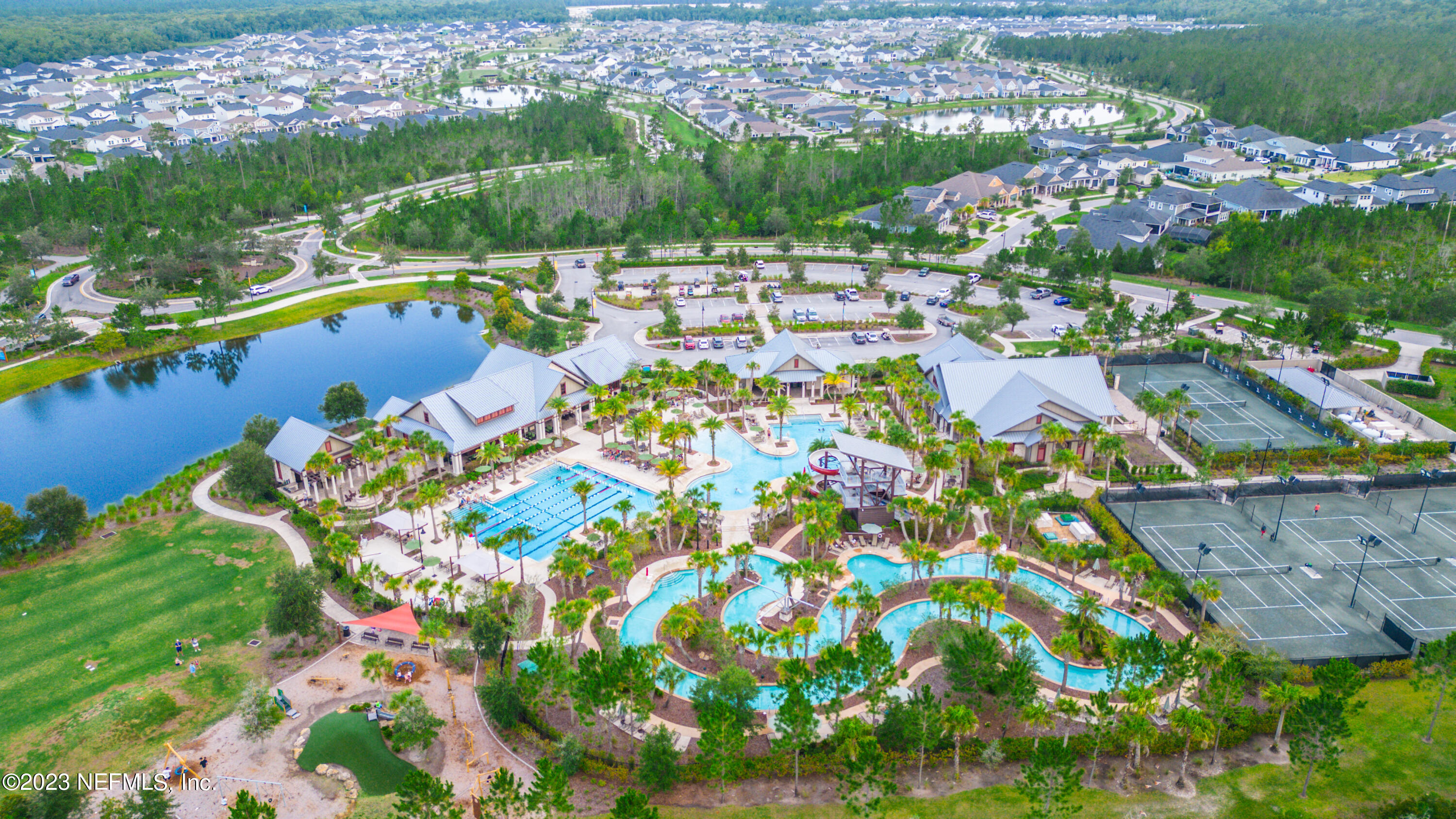 321 Beale Avenue St. Augustine, FL 32092 - Photo 34 of 35 a view of a swimming pool with lawn chairs and plants