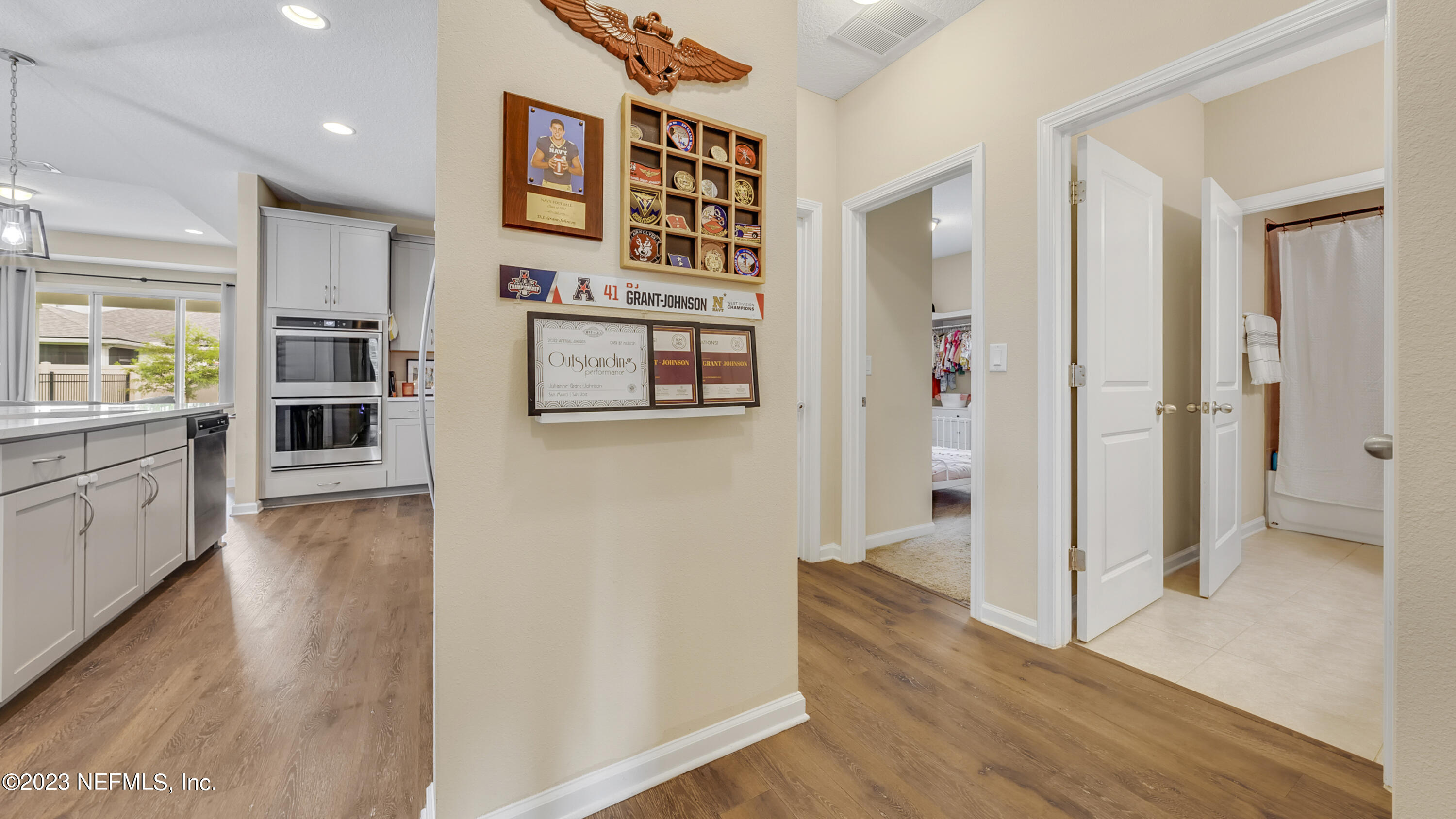 321 Beale Avenue St. Augustine, FL 32092 - Photo 9 of 35 a view of a kitchen cabinets and wooden floor