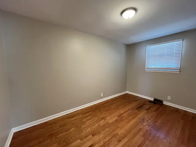 an empty room with a workspace