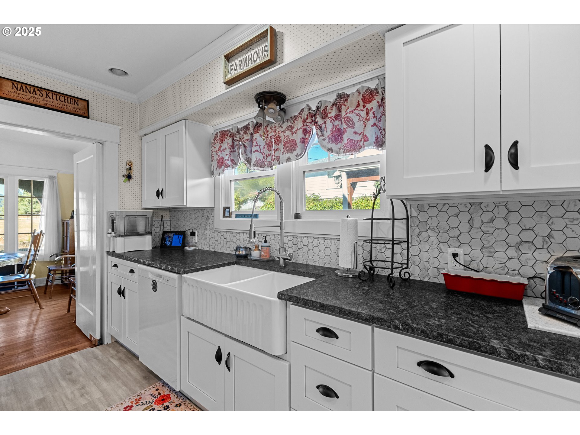 1112 Spruce Street Myrtle Point, OR 97458 - Photo 18 of 47 a kitchen with stainless steel appliances granite countertop a sink stove and cabinets