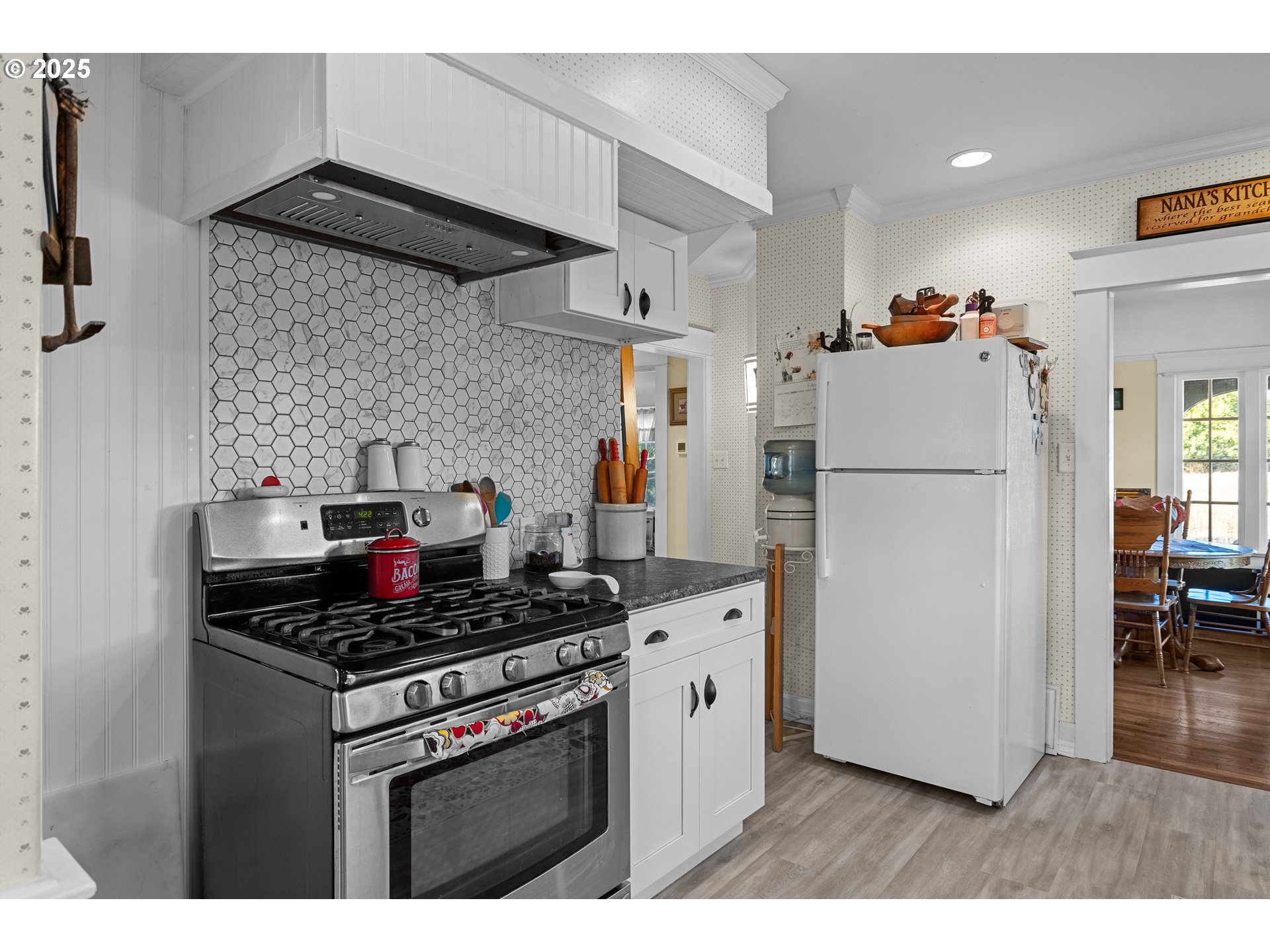 1112 Spruce Street Myrtle Point, OR 97458 - Photo 20 of 47 a kitchen with stainless steel appliances a stove a refrigerator and a refrigerator
