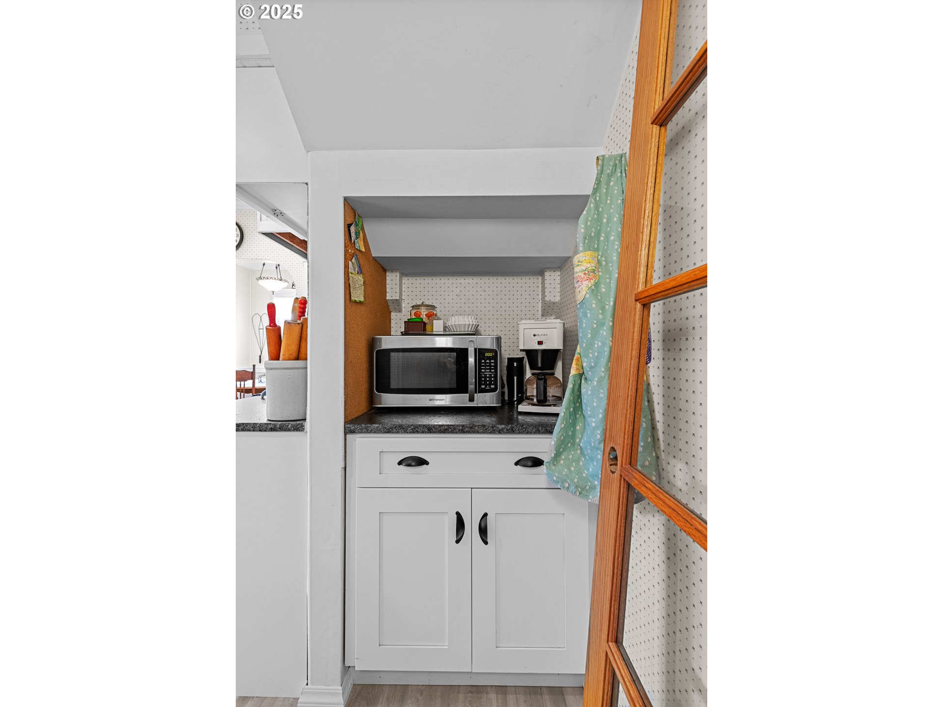 1112 Spruce Street Myrtle Point, OR 97458 - Photo 22 of 47 a kitchen with a sink and a refrigerator