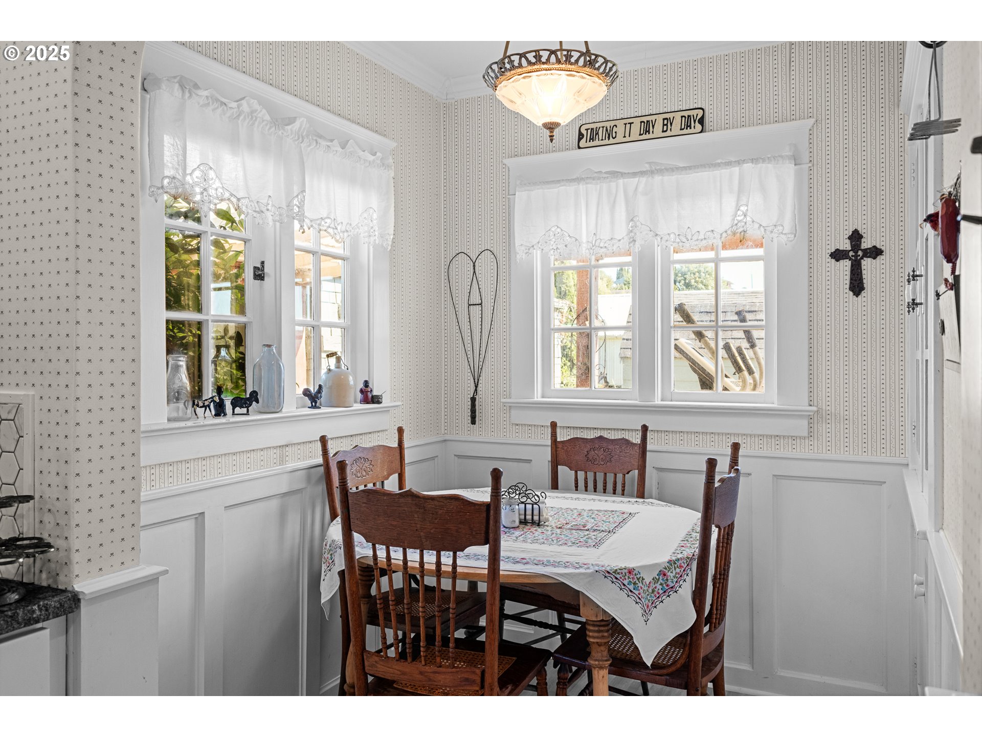 1112 Spruce Street Myrtle Point, OR 97458 - Photo 23 of 47 a view of a dining room with furniture and window