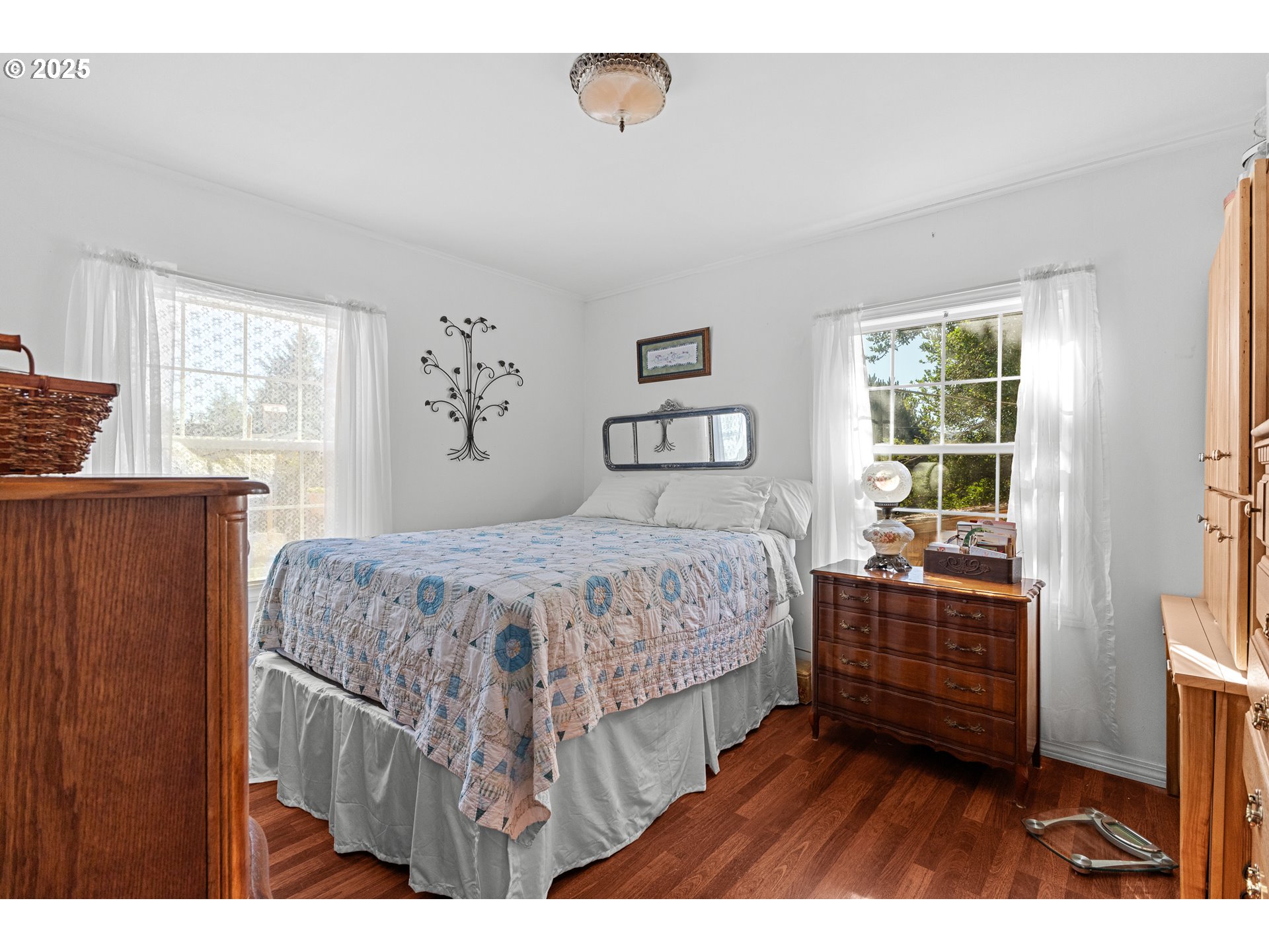 1112 Spruce Street Myrtle Point, OR 97458 - Photo 25 of 47 a bedroom with a bed and a window