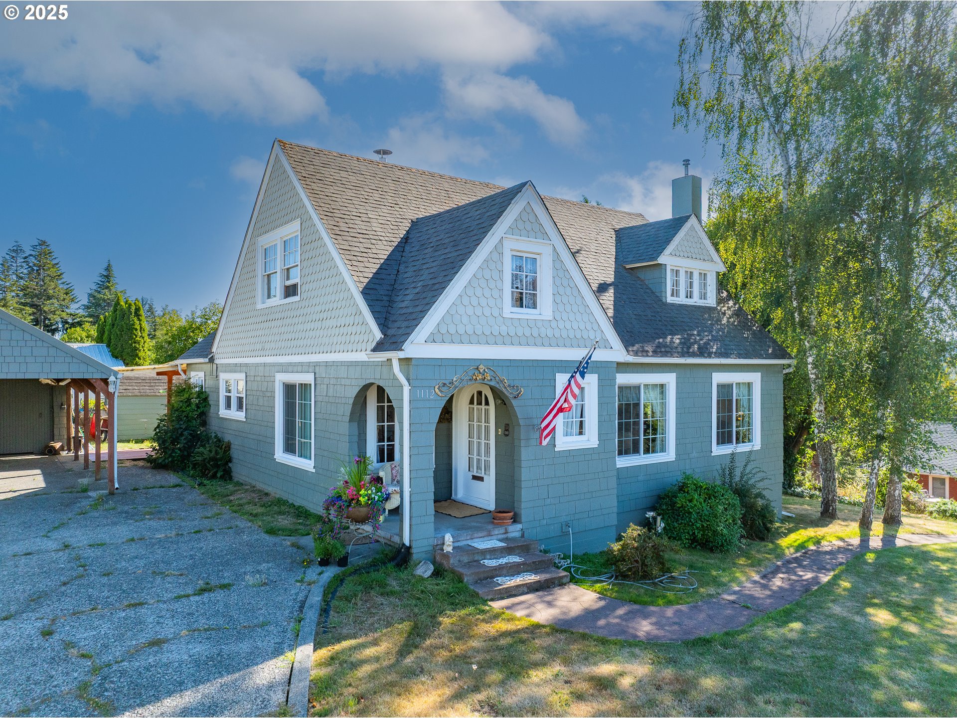 1112 Spruce Street Myrtle Point, OR 97458 - Photo 3 of 47 a front view of a house with a yard