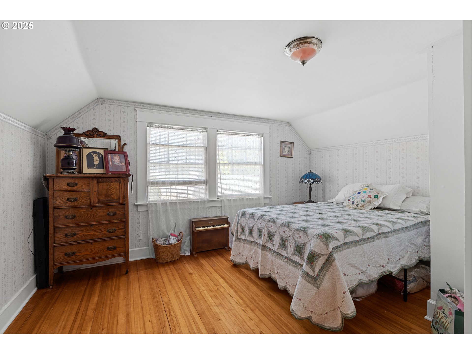 1112 Spruce Street Myrtle Point, OR 97458 - Photo 32 of 47 a bedroom with a bed and a closet