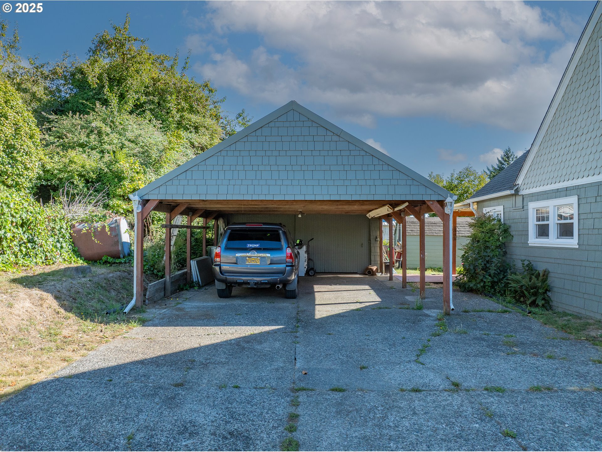 1112 Spruce Street Myrtle Point, OR 97458 - Photo 40 of 47 a view of a house with a yard and sitting area