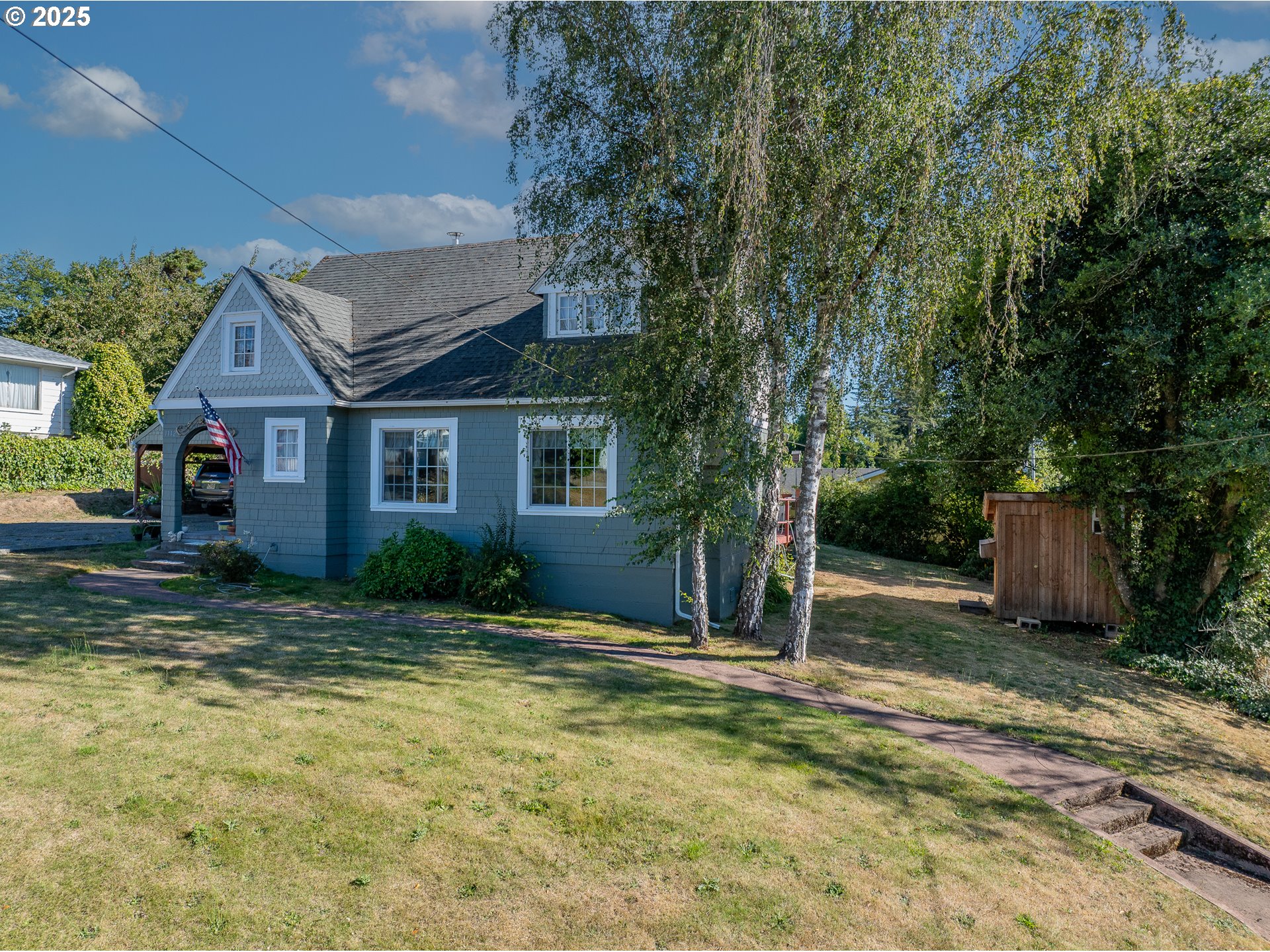 1112 Spruce Street Myrtle Point, OR 97458 - Photo 4 of 47 a view of a house with backyard and trees