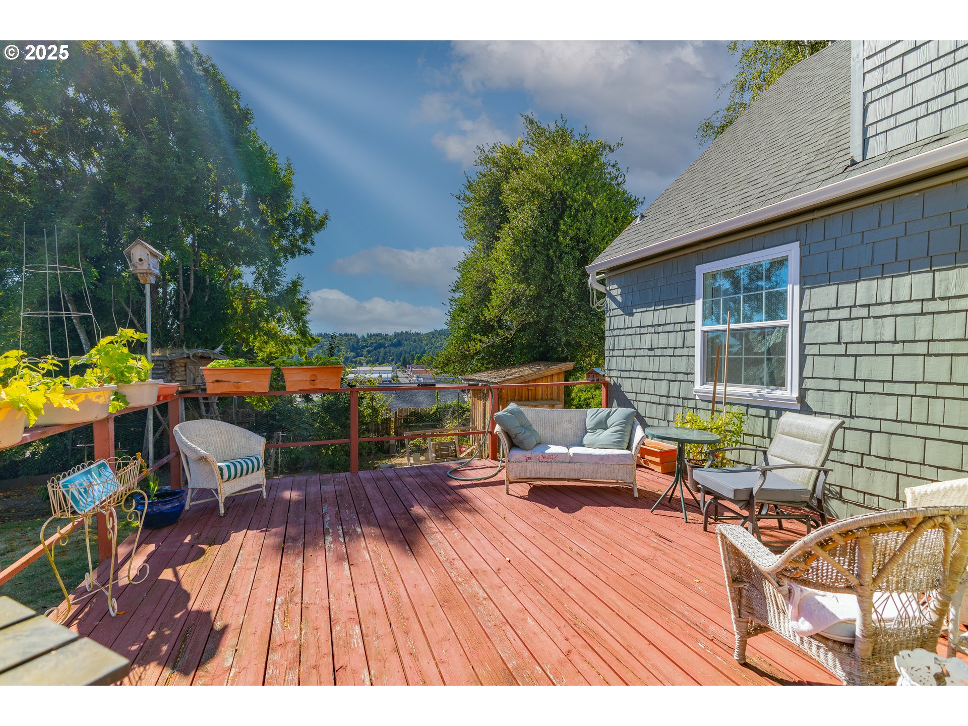 1112 Spruce Street Myrtle Point, OR 97458 - Photo 42 of 47 an outdoor sitting area with furniture and wooden floor