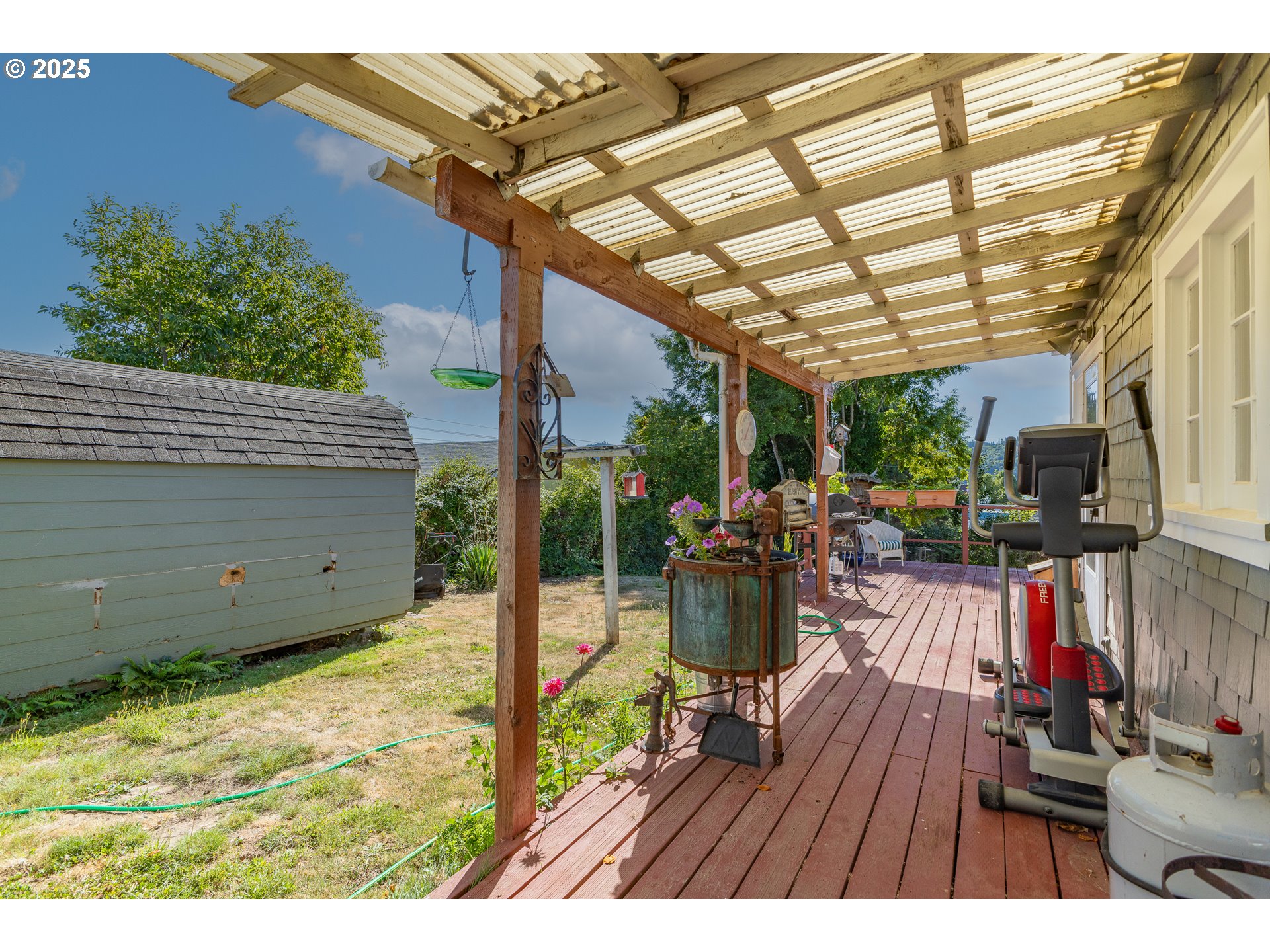 1112 Spruce Street Myrtle Point, OR 97458 - Photo 44 of 47 a view of a backyard with sitting area