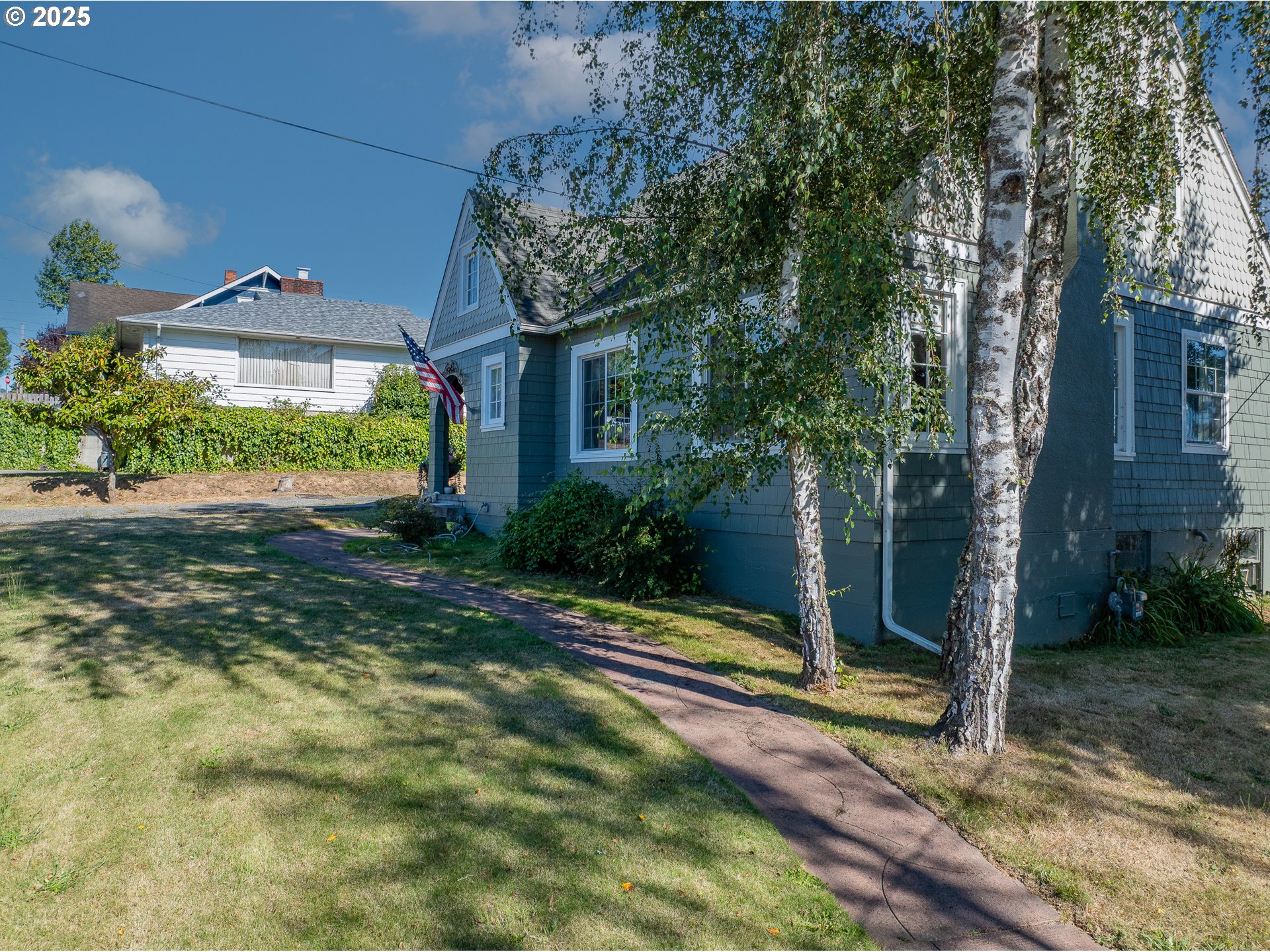 1112 Spruce Street Myrtle Point, OR 97458 - Photo 5 of 47 a view of a back yard of the house