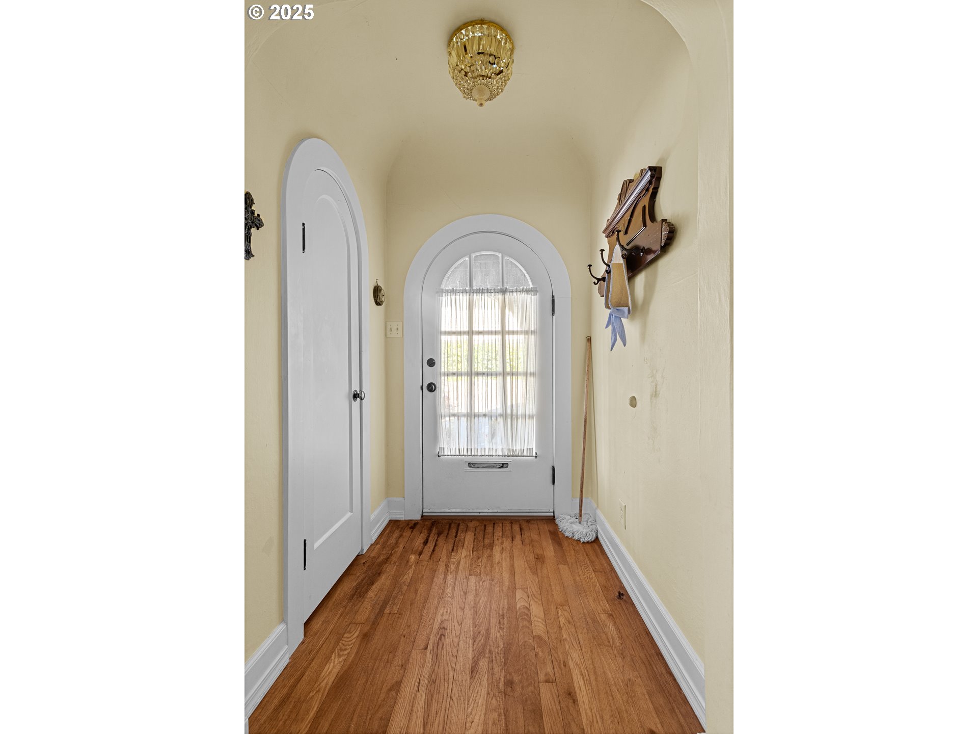 1112 Spruce Street Myrtle Point, OR 97458 - Photo 9 of 47 a view of a hallway with wooden floor