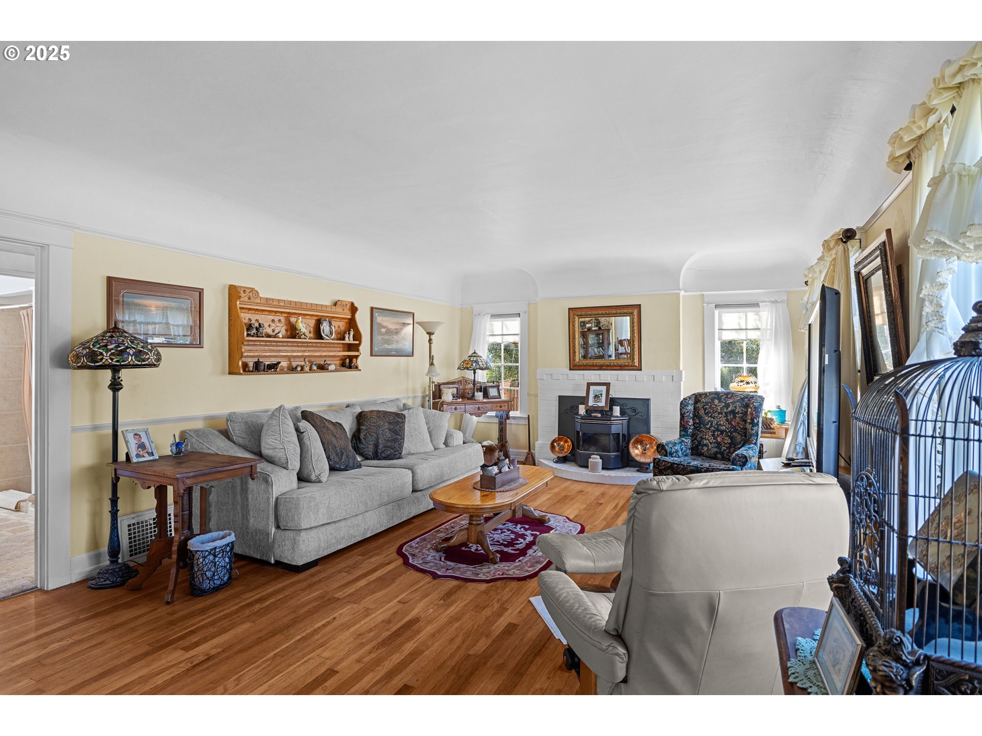 1112 Spruce Street Myrtle Point, OR 97458 - Photo 10 of 47 a living room with furniture and a flat screen tv