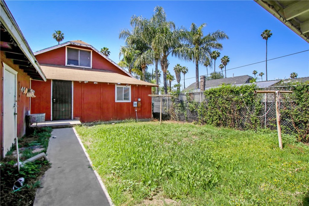 3463 Washington Street Riverside, CA 92504 - Photo 21 of 24 a front view of a house with a yard