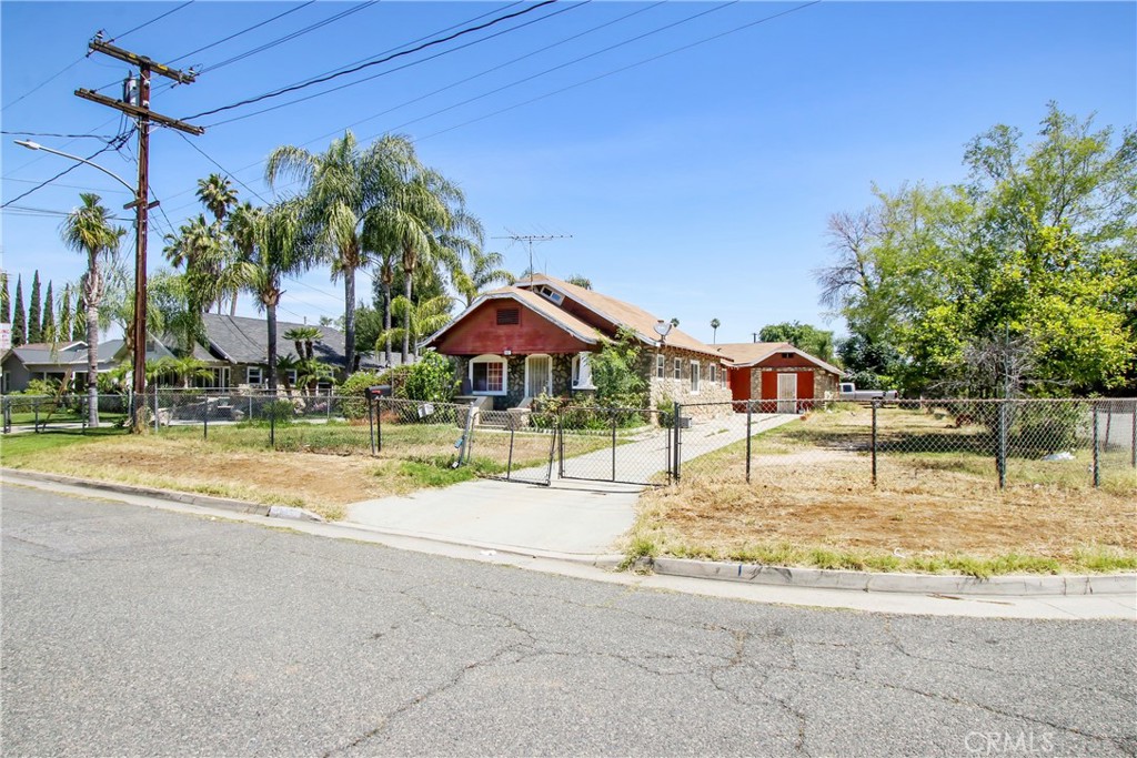 3463 Washington Street Riverside, CA 92504 - Photo 24 of 24 a swimming pool with outdoor seating and yard