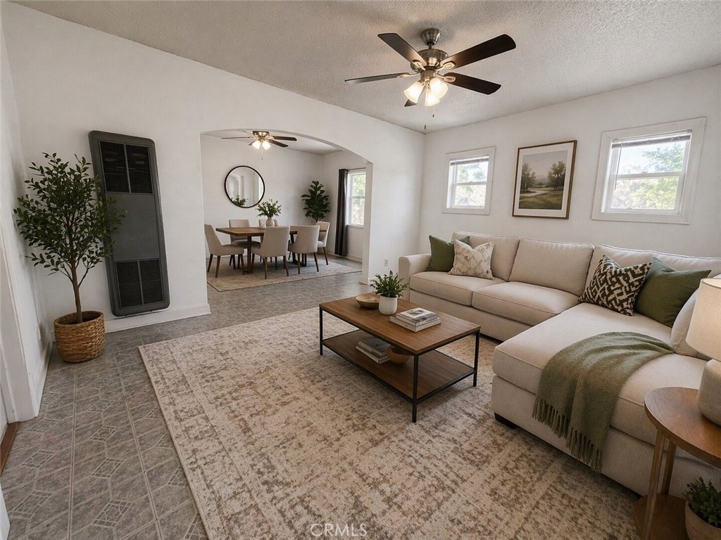 3463 Washington Street Riverside, CA 92504 - Photo 5 of 24 a living room with furniture and a large window