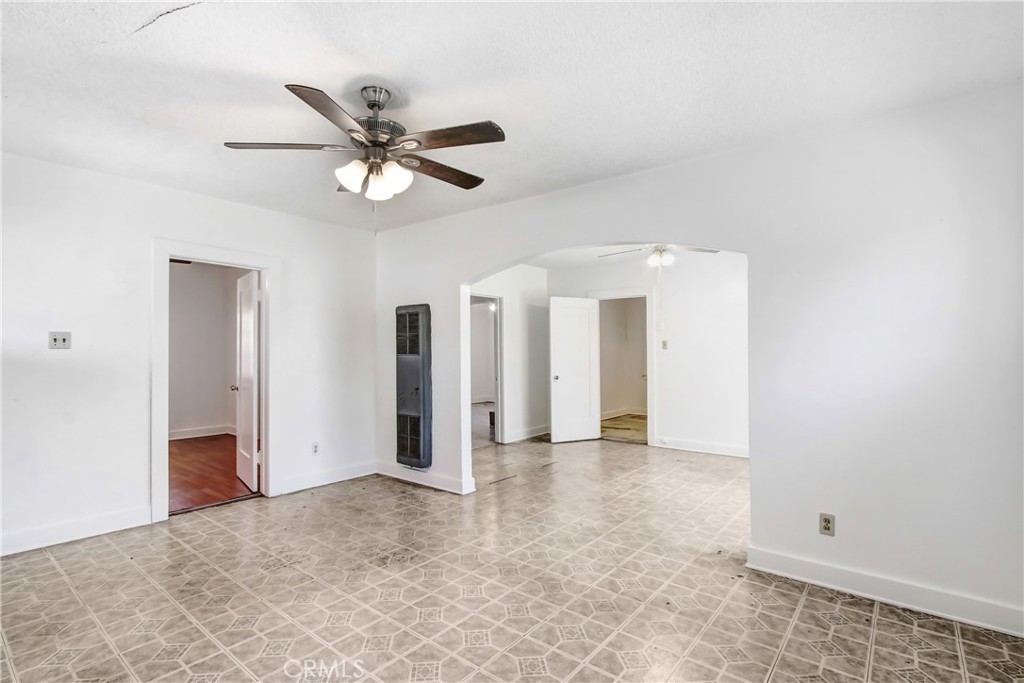 3463 Washington Street Riverside, CA 92504 - Photo 6 of 24 a view of a livingroom with a ceiling fan and window