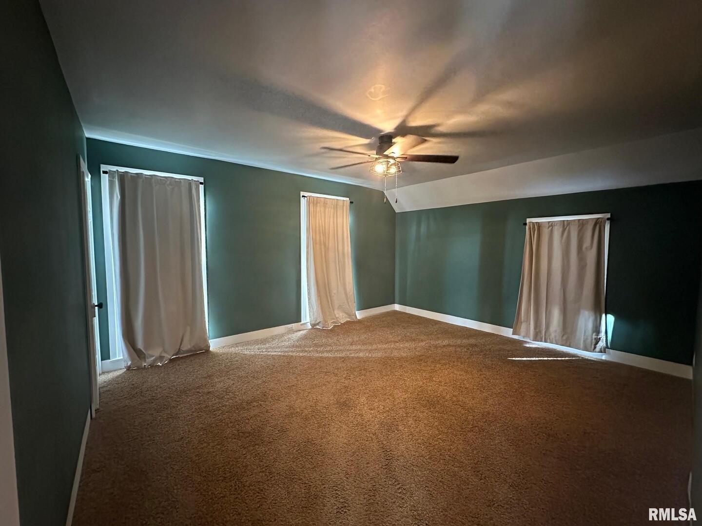 323 Lincoln Street Miles, IA 52064 - Photo 20 of 34 a big room with closet and windows