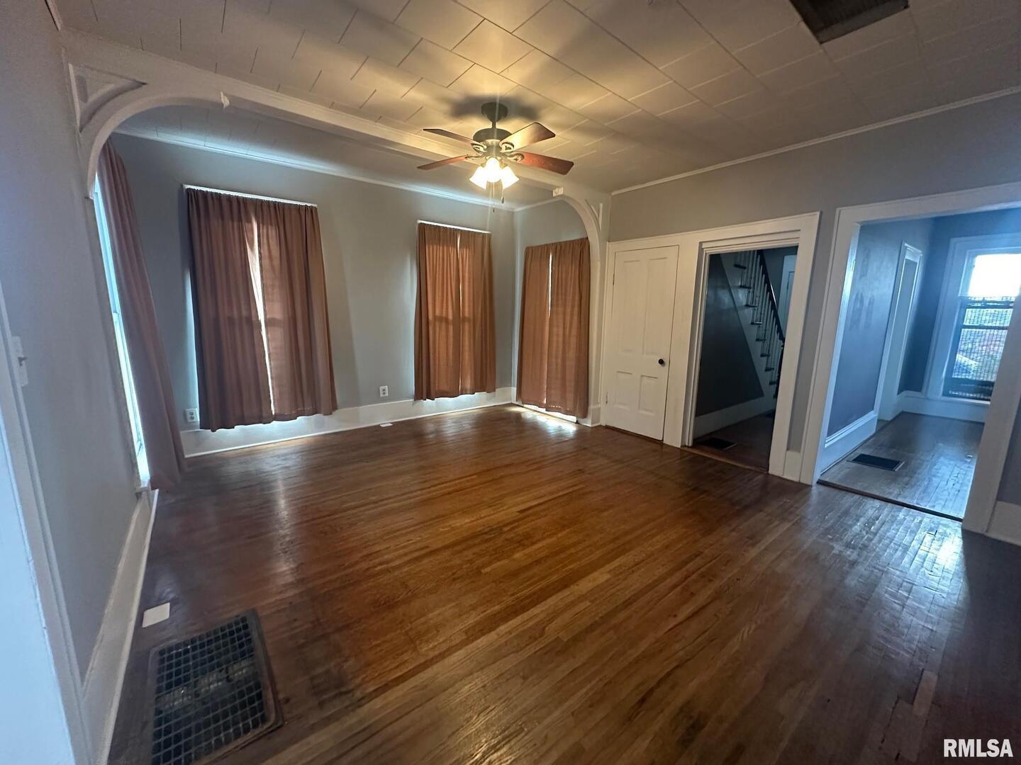323 Lincoln Street Miles, IA 52064 - Photo 2 of 34 a view of a hallway with wooden floor