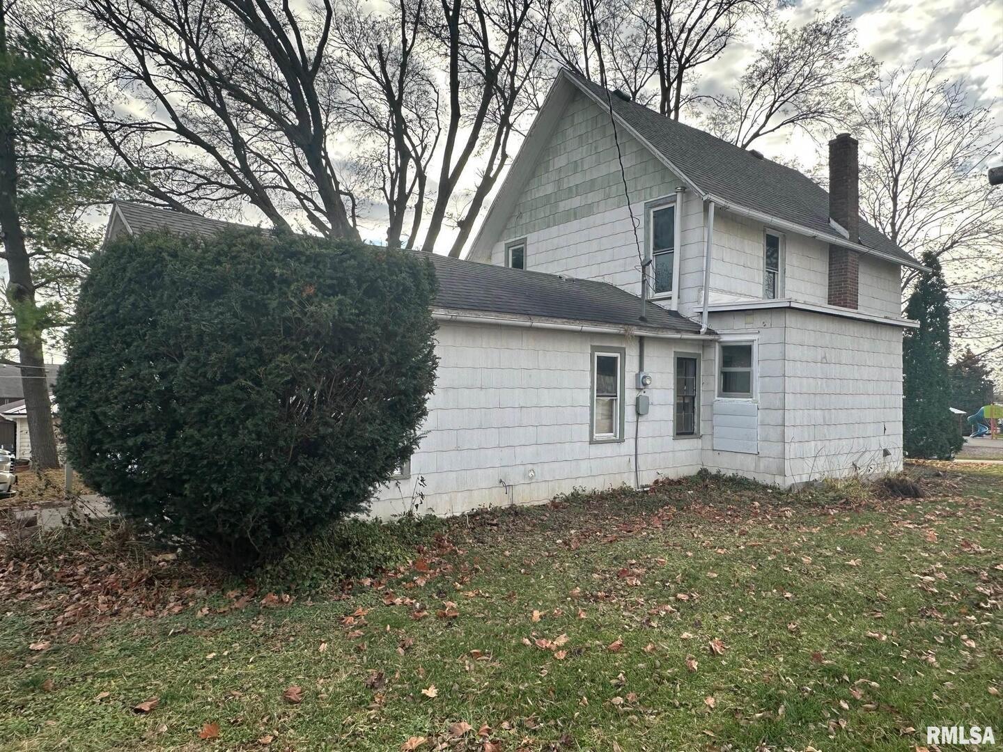 323 Lincoln Street Miles, IA 52064 - Photo 24 of 34 a view of a house with a yard