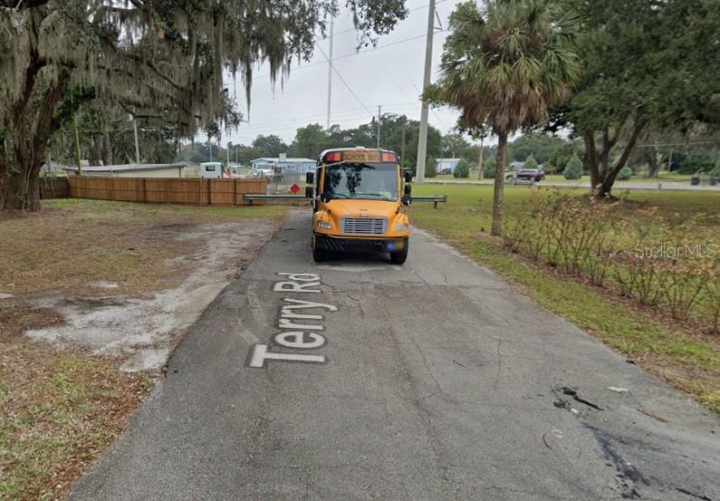 1607 Terry Road Lakeland, FL 33801 - Photo 2 of 6 a front view of a house with a yard