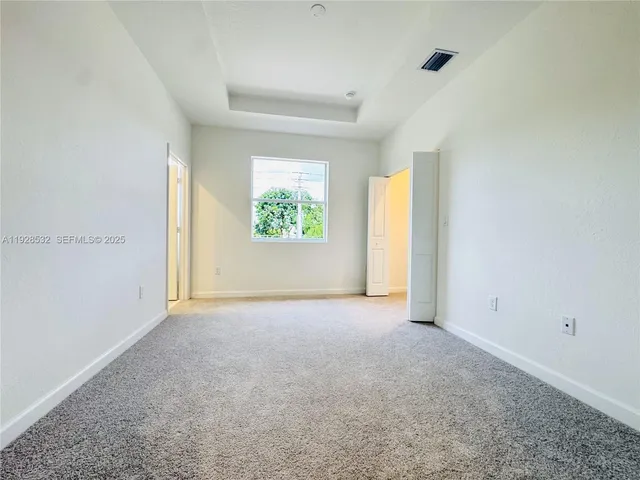 an empty room with a natural light