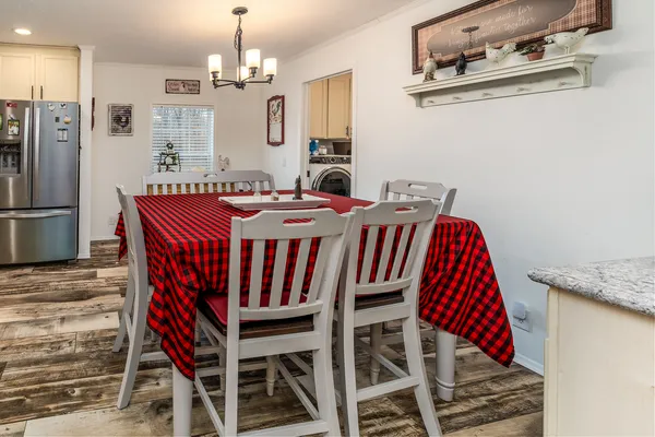 a view of a dining room with furniture
