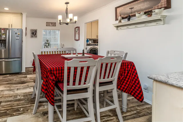 a view of a dining room with furniture
