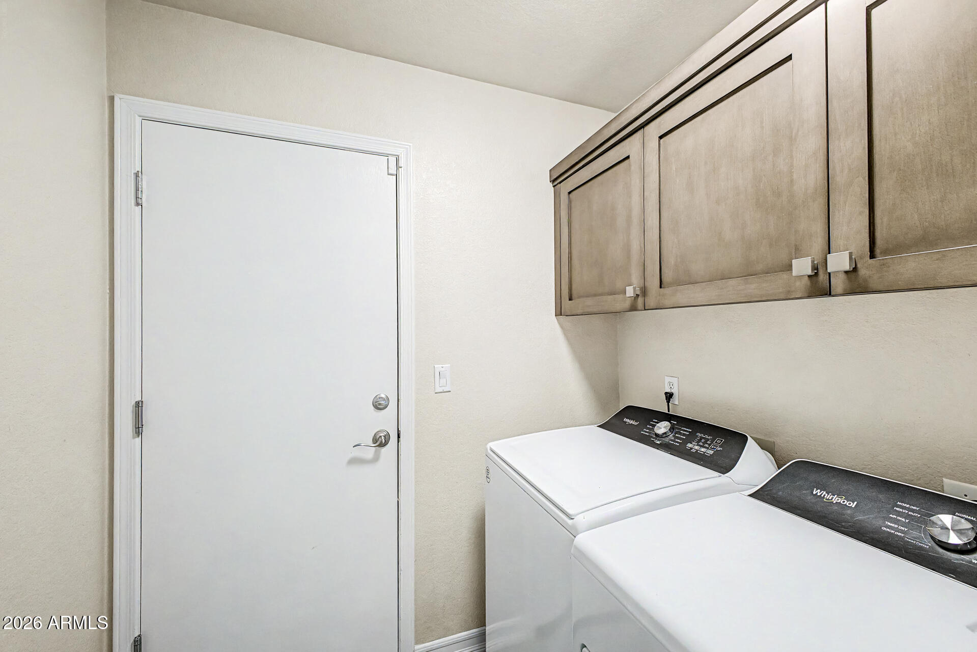 4102 East Rock Wren Road Phoenix, AZ 85044 - Photo 19 of 25 a utility room with dryer and washer