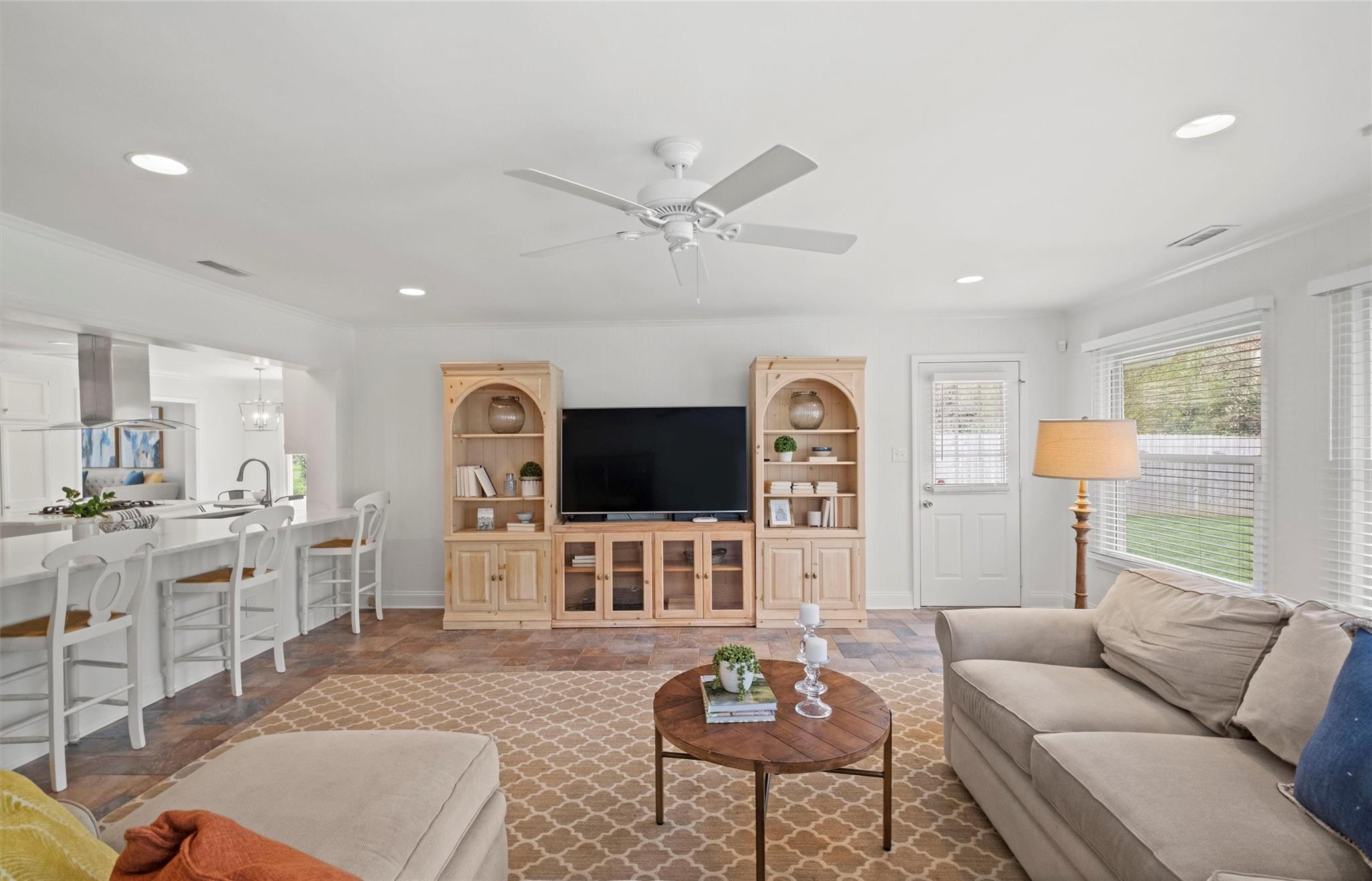 245 Scofield Road Charlotte, NC 28209 - Photo 20 of 33 a living room with furniture a fireplace and a flat screen tv