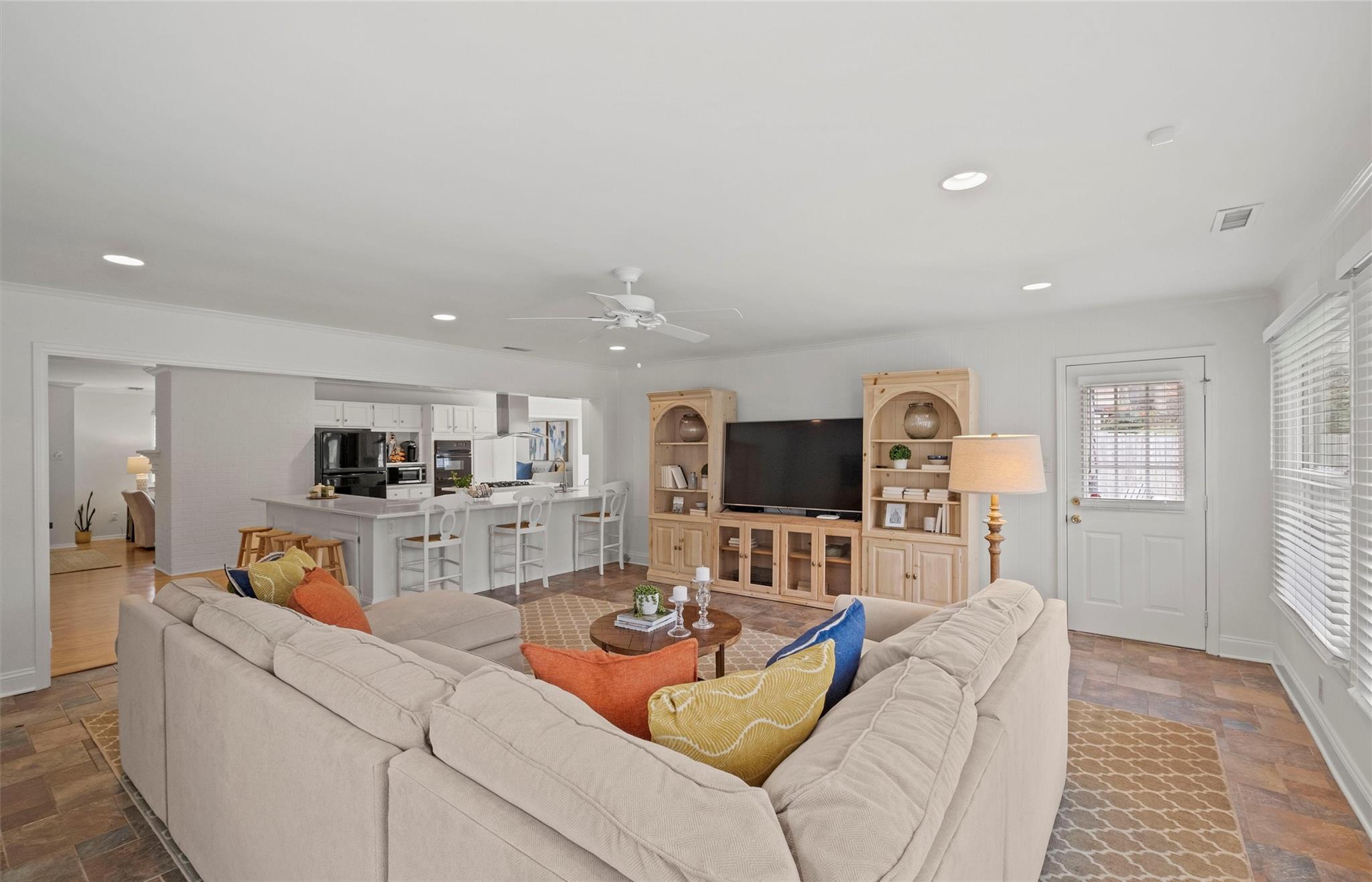 245 Scofield Road Charlotte, NC 28209 - Photo 21 of 33 a living room with furniture and a flat screen tv