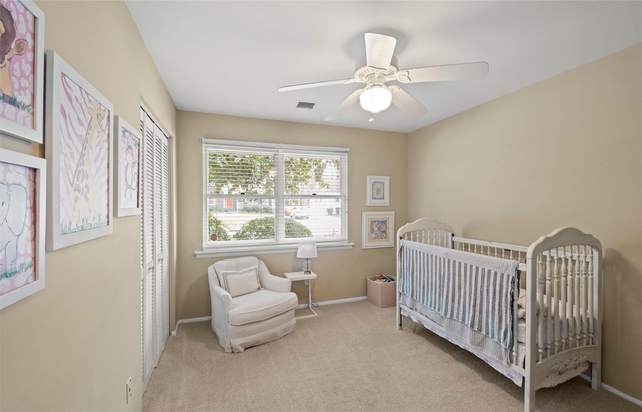 245 Scofield Road Charlotte, NC 28209 - Photo 23 of 33 a bedroom with furniture and a large window