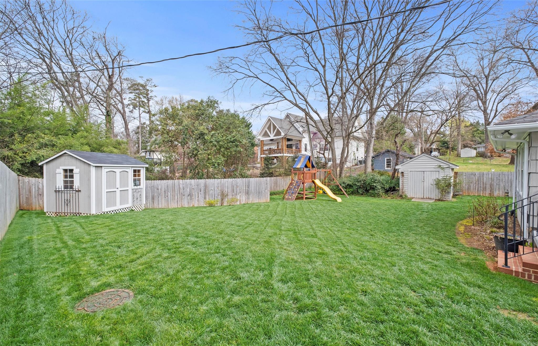 245 Scofield Road Charlotte, NC 28209 - Photo 30 of 33 a view of a house with backyard and a tree