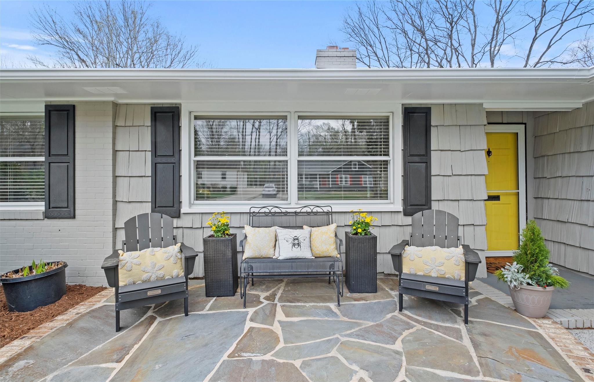 245 Scofield Road Charlotte, NC 28209 - Photo 3 of 33 a building outdoor space with patio furniture