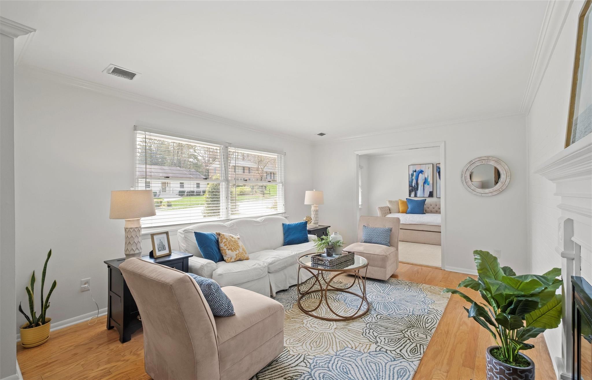 245 Scofield Road Charlotte, NC 28209 - Photo 6 of 33 a living room with furniture and a large window