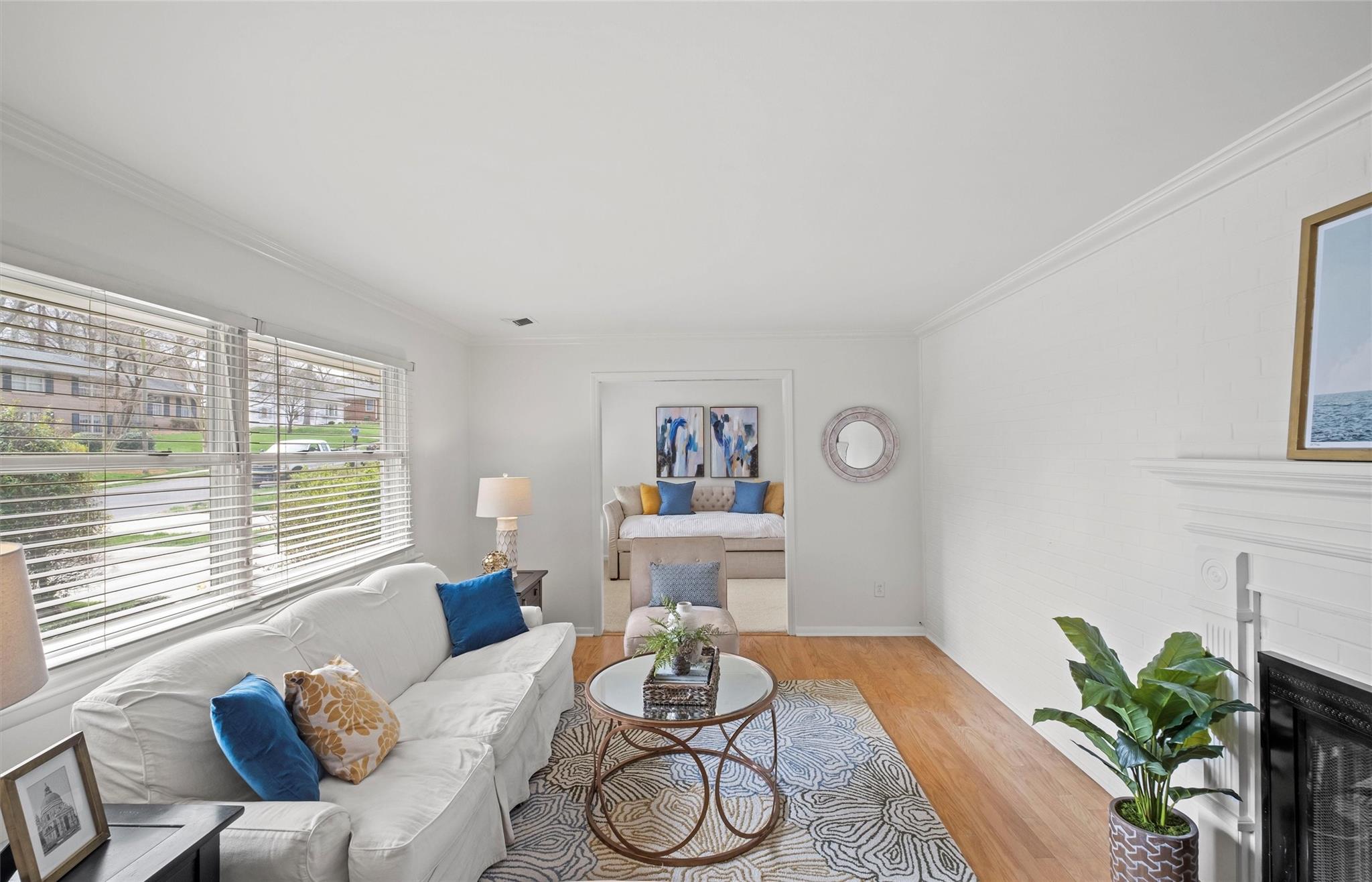 245 Scofield Road Charlotte, NC 28209 - Photo 7 of 33 a living room with furniture and a large window