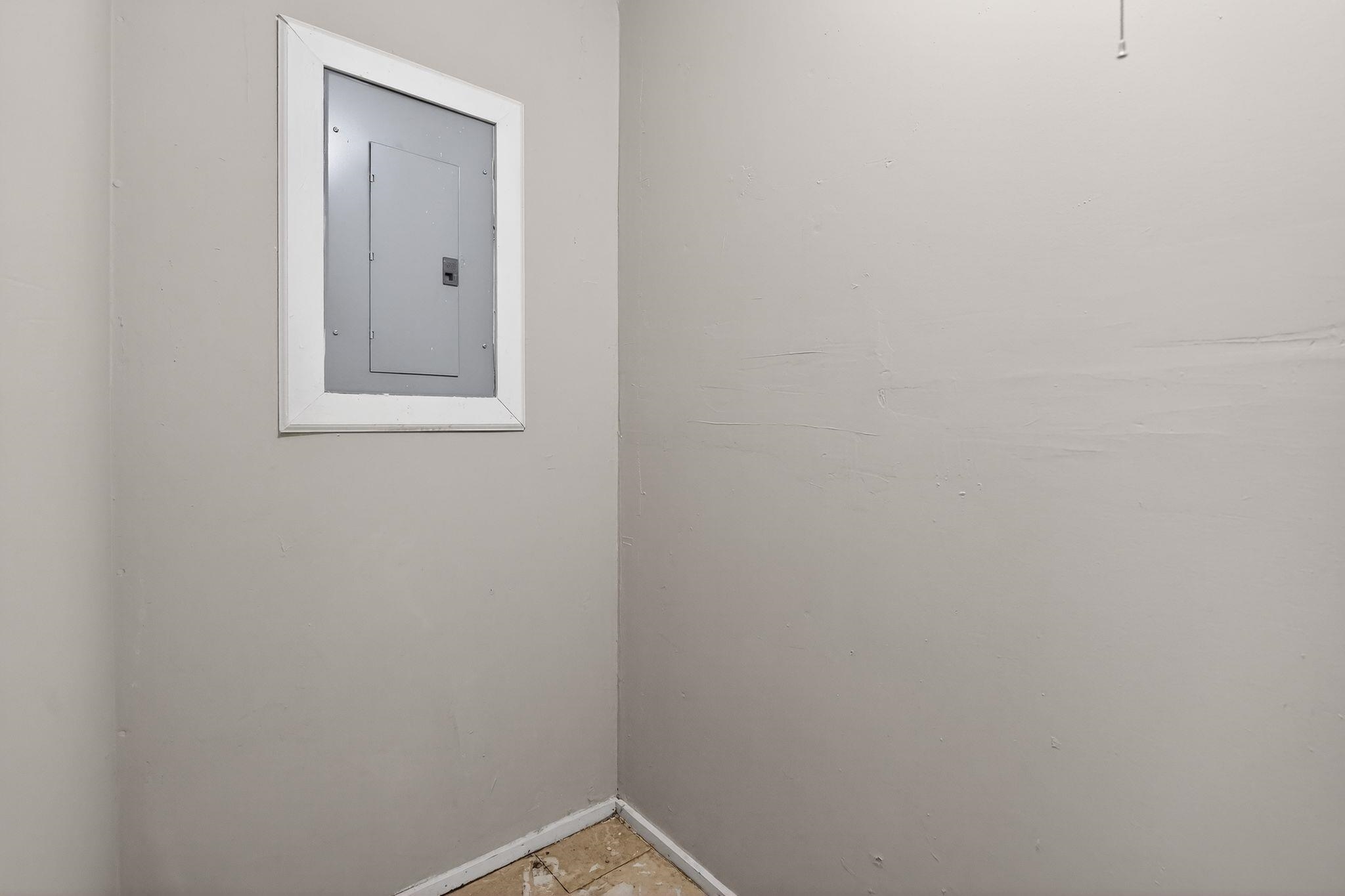 4094 Double Tree Street Memphis, TN 38109 - Photo 14 of 31 Empty room featuring electric panel and baseboards