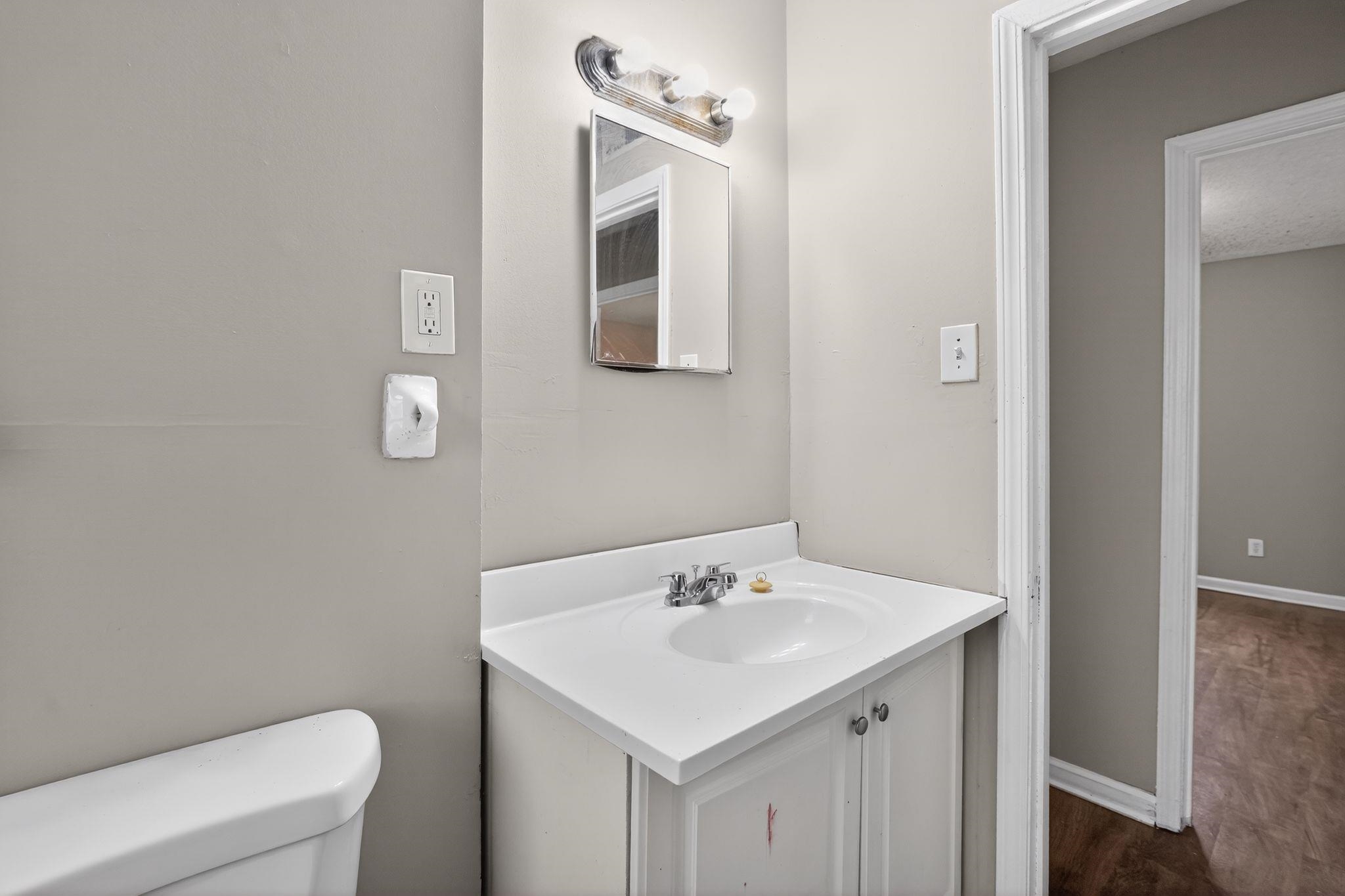 4094 Double Tree Street Memphis, TN 38109 - Photo 27 of 31 Bathroom with vanity and dark wood finished floors