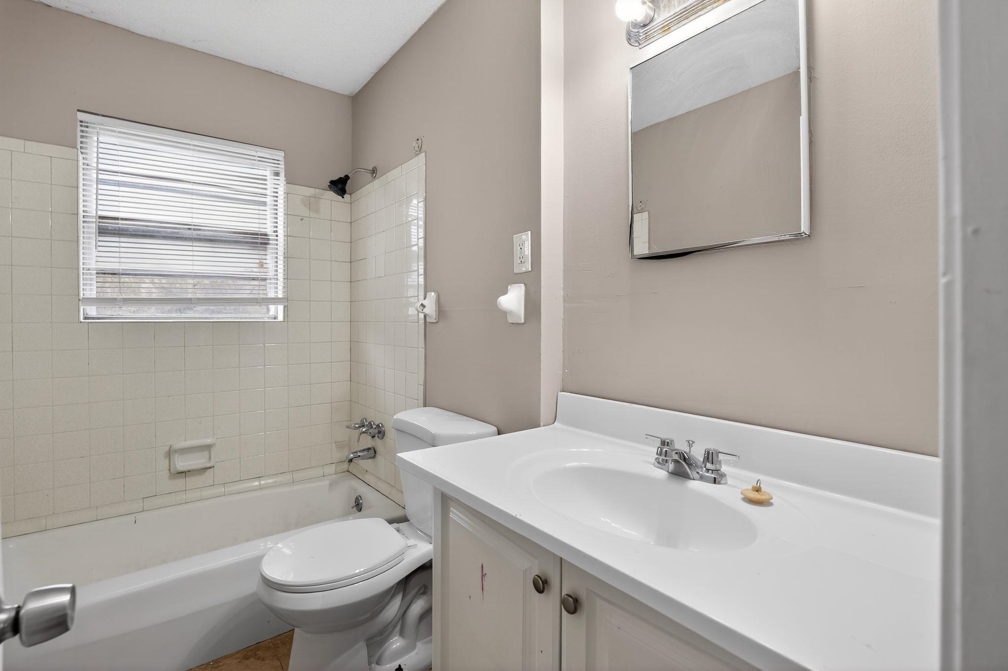 4094 Double Tree Street Memphis, TN 38109 - Photo 28 of 31 Bathroom featuring vanity and bathtub / shower combination