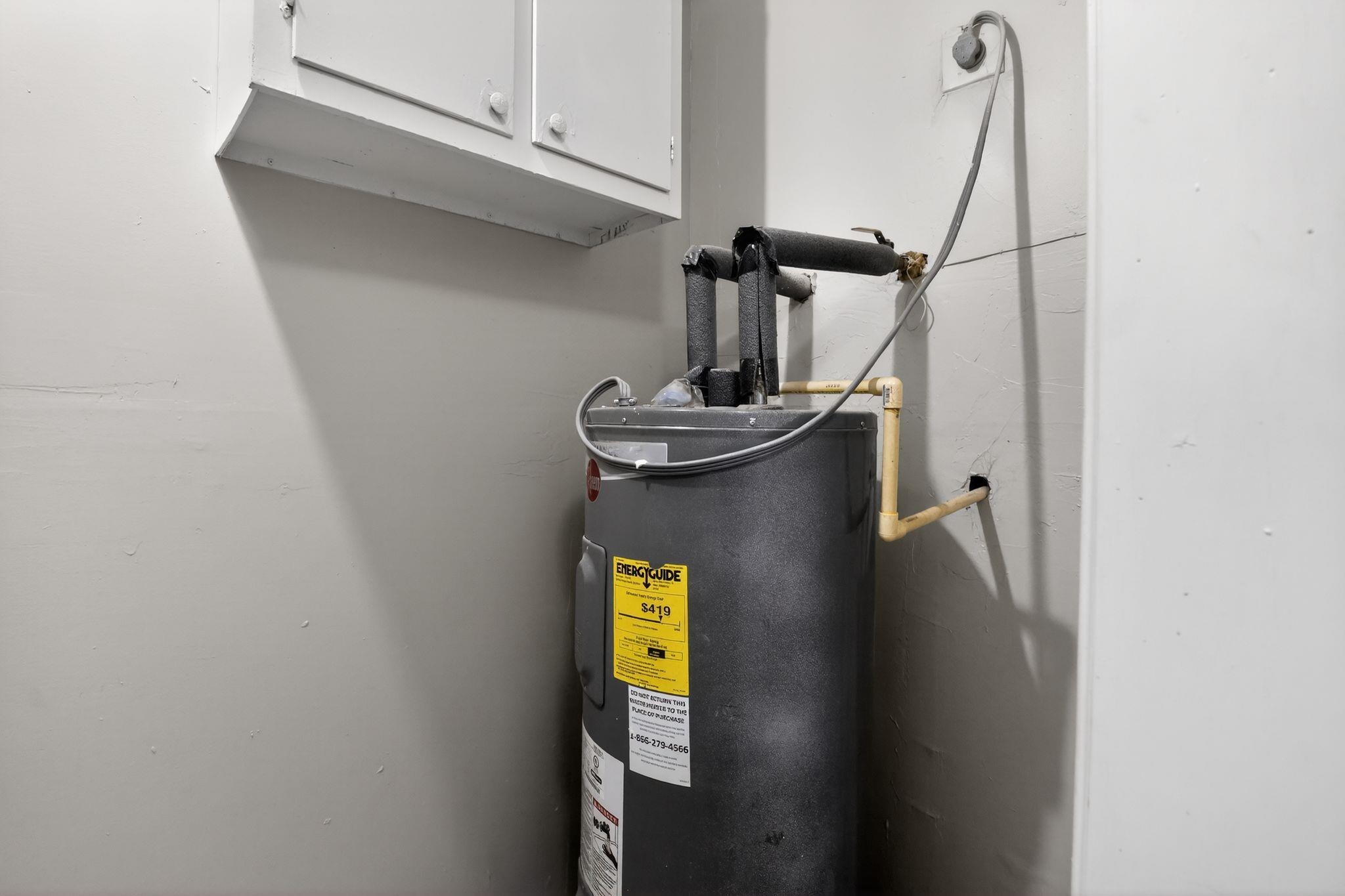 4094 Double Tree Street Memphis, TN 38109 - Photo 30 of 31 Utility room featuring water heater