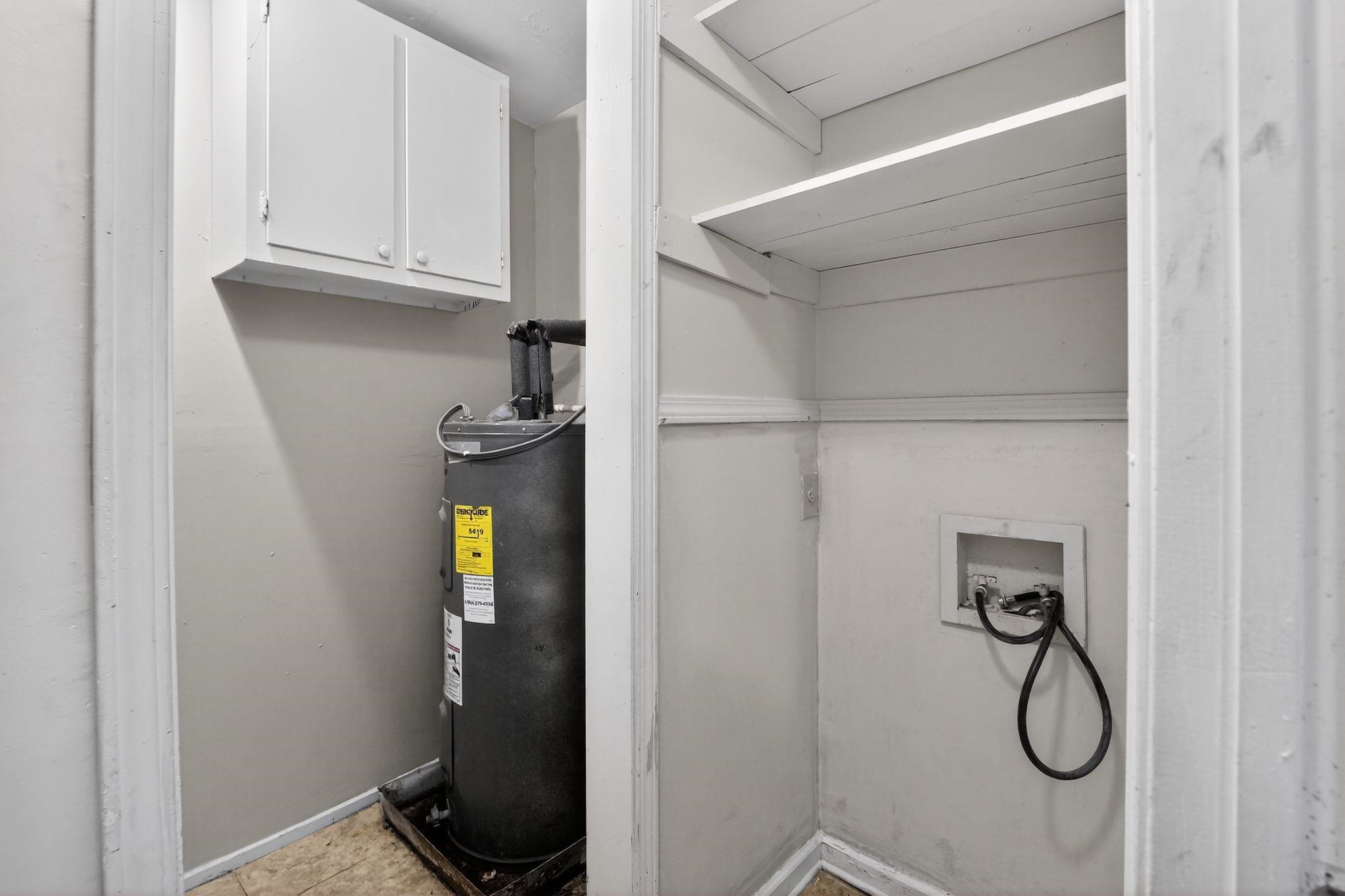4094 Double Tree Street Memphis, TN 38109 - Photo 31 of 31 Utility room featuring electric water heater