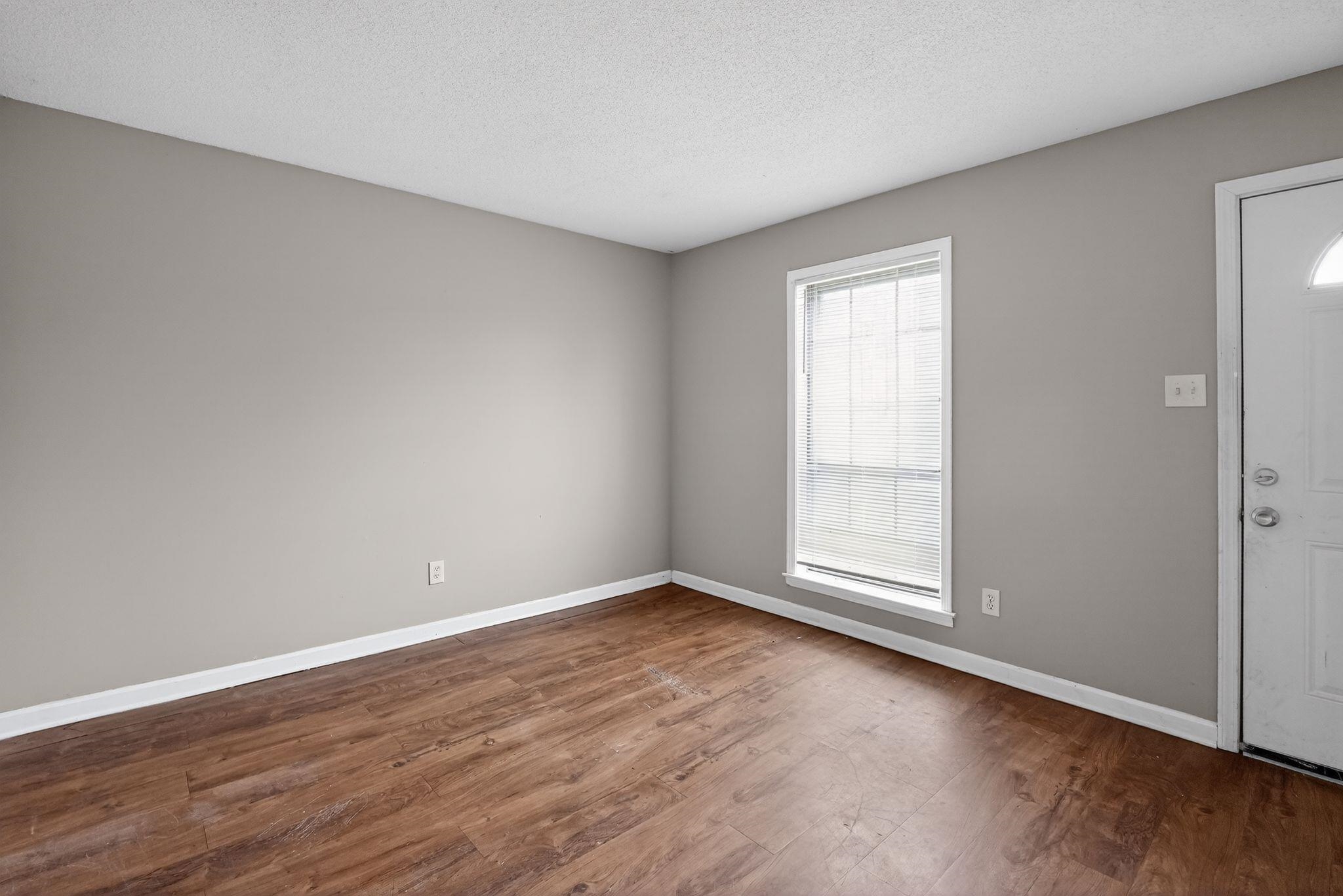 4094 Double Tree Street Memphis, TN 38109 - Photo 10 of 31 Foyer with dark wood finished floors and a textured ceiling