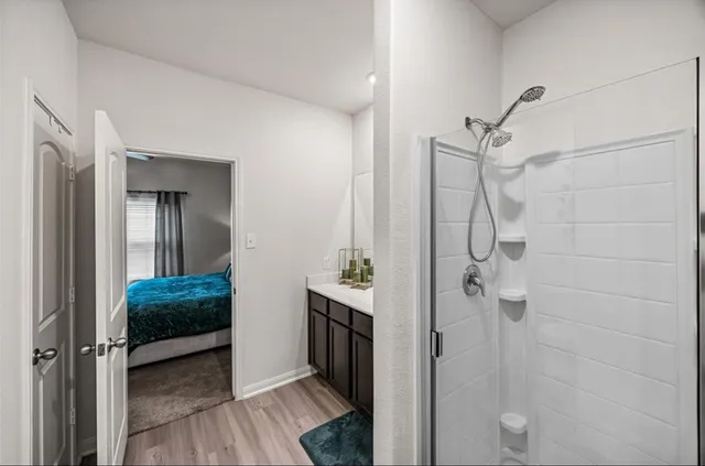 a view of a bathroom from a hallway