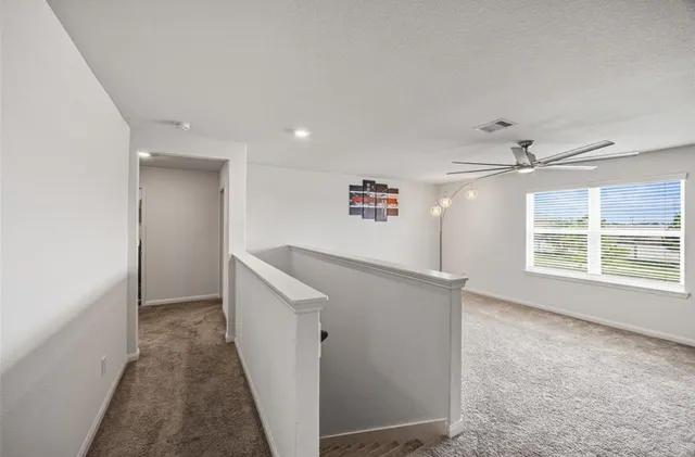 a view of hallway with window