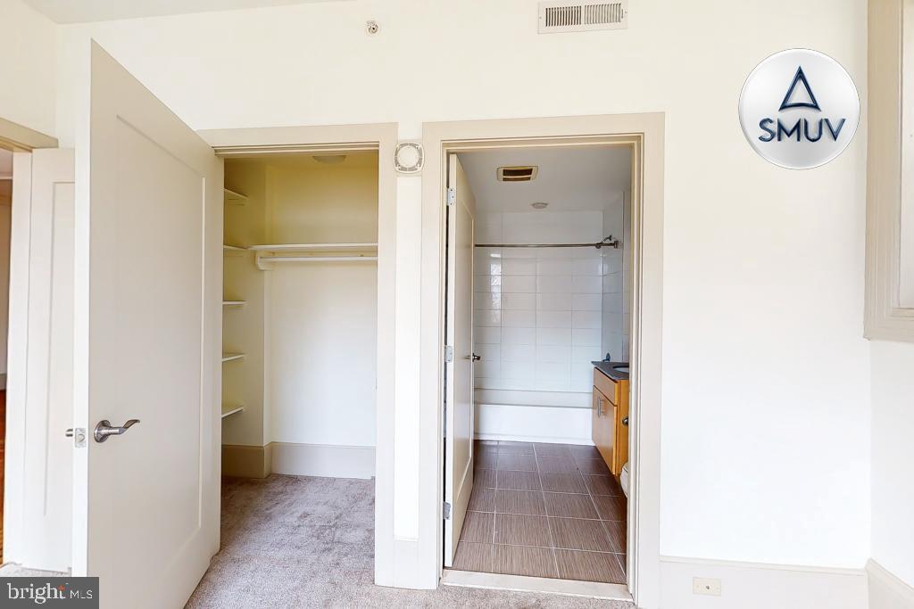 11 East Chase Street, Unit 506 Baltimore, MD 21202 - Photo 12 of 32 Spacious entryway to closet and bathroom.